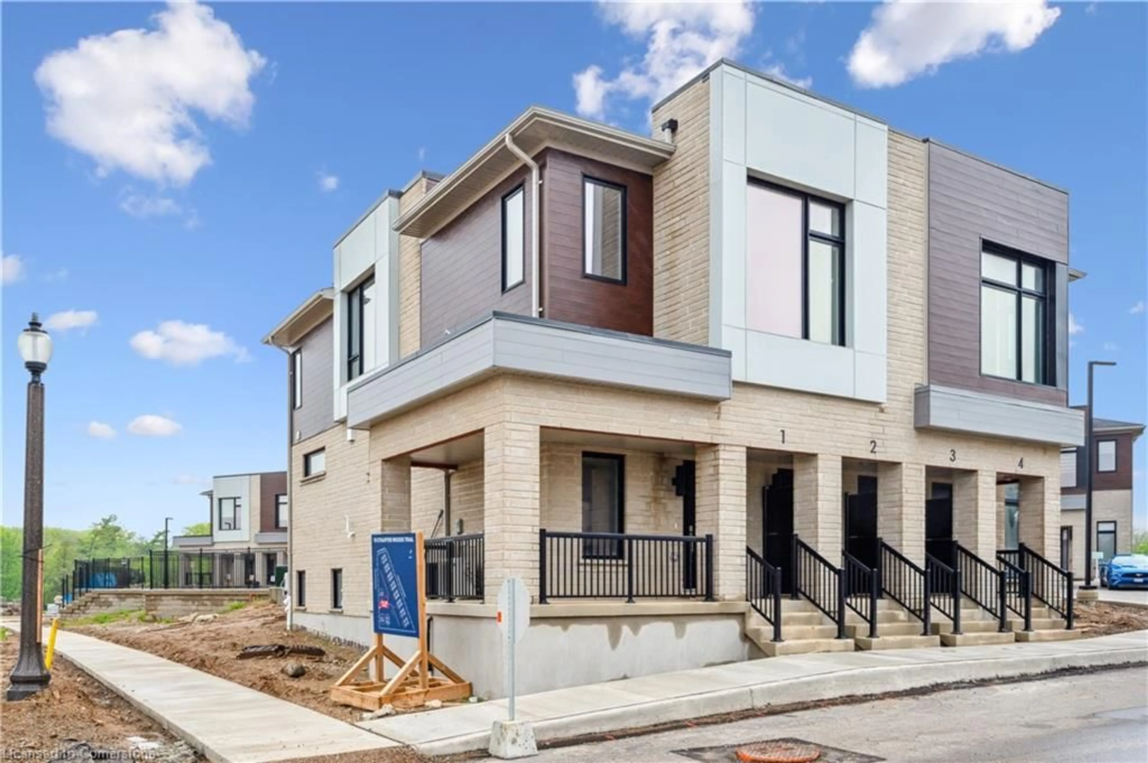 Home with brick exterior material, street for 15 Stauffer Woods Trail #A01, Waterloo Ontario N2P 2P4