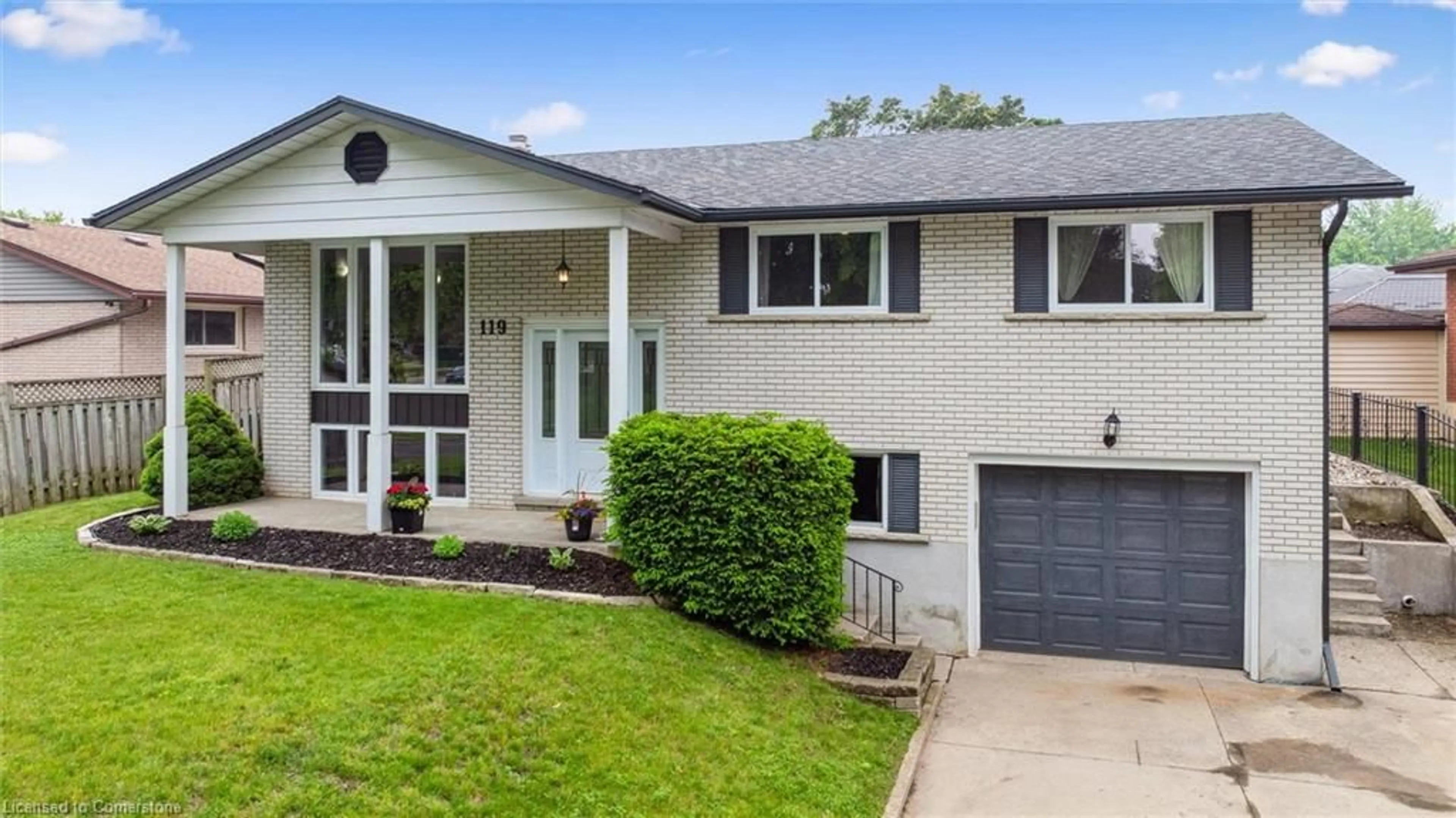 Home with vinyl exterior material, street for 119 Gibson Dr, Kitchener Ontario N2B 2P7