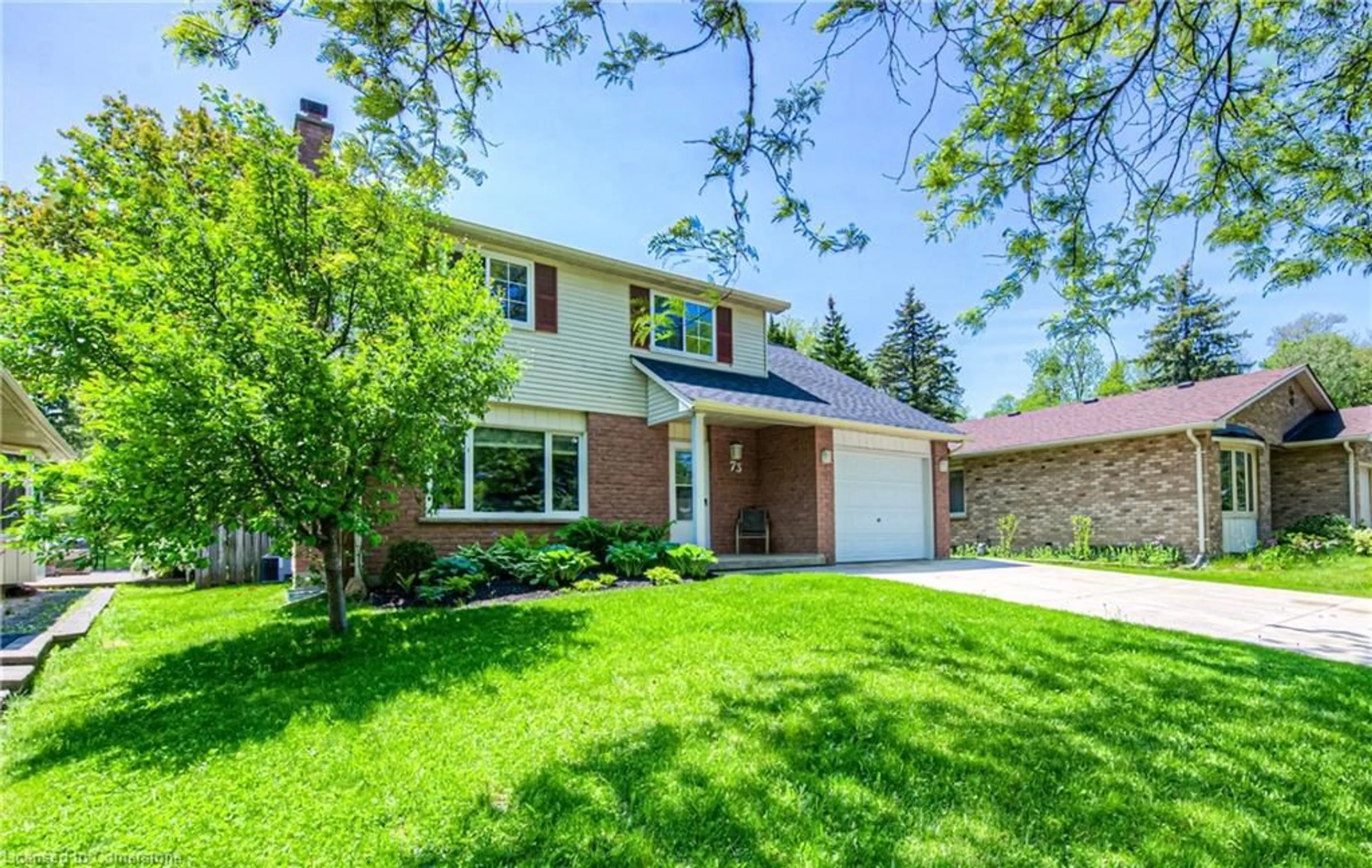 Home with brick exterior material, street for 73 Mayfield Ave, Waterloo Ontario N2J 3R9