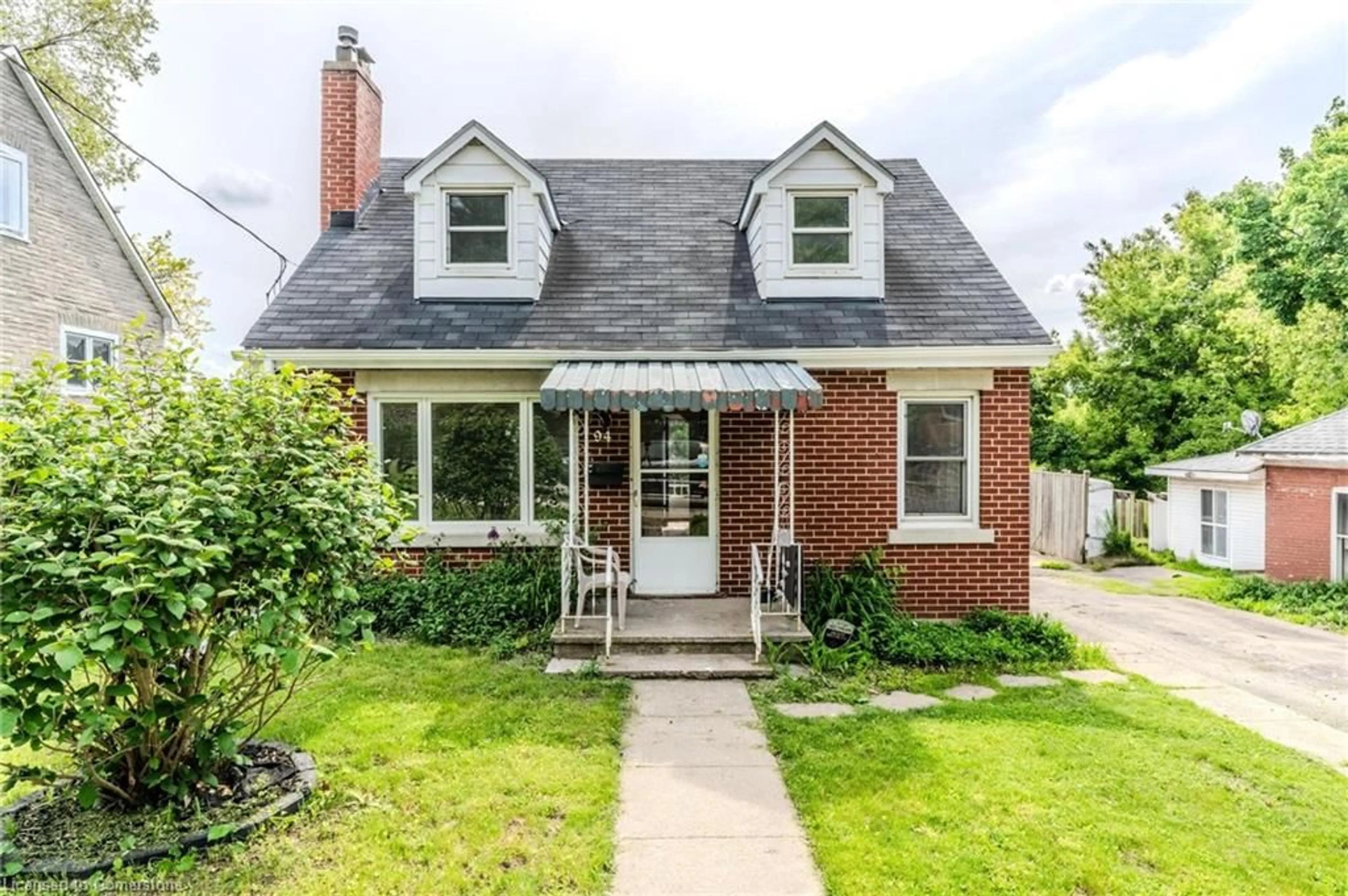 Home with brick exterior material, street for 94 Beech Ave, Cambridge Ontario N3C 1X5