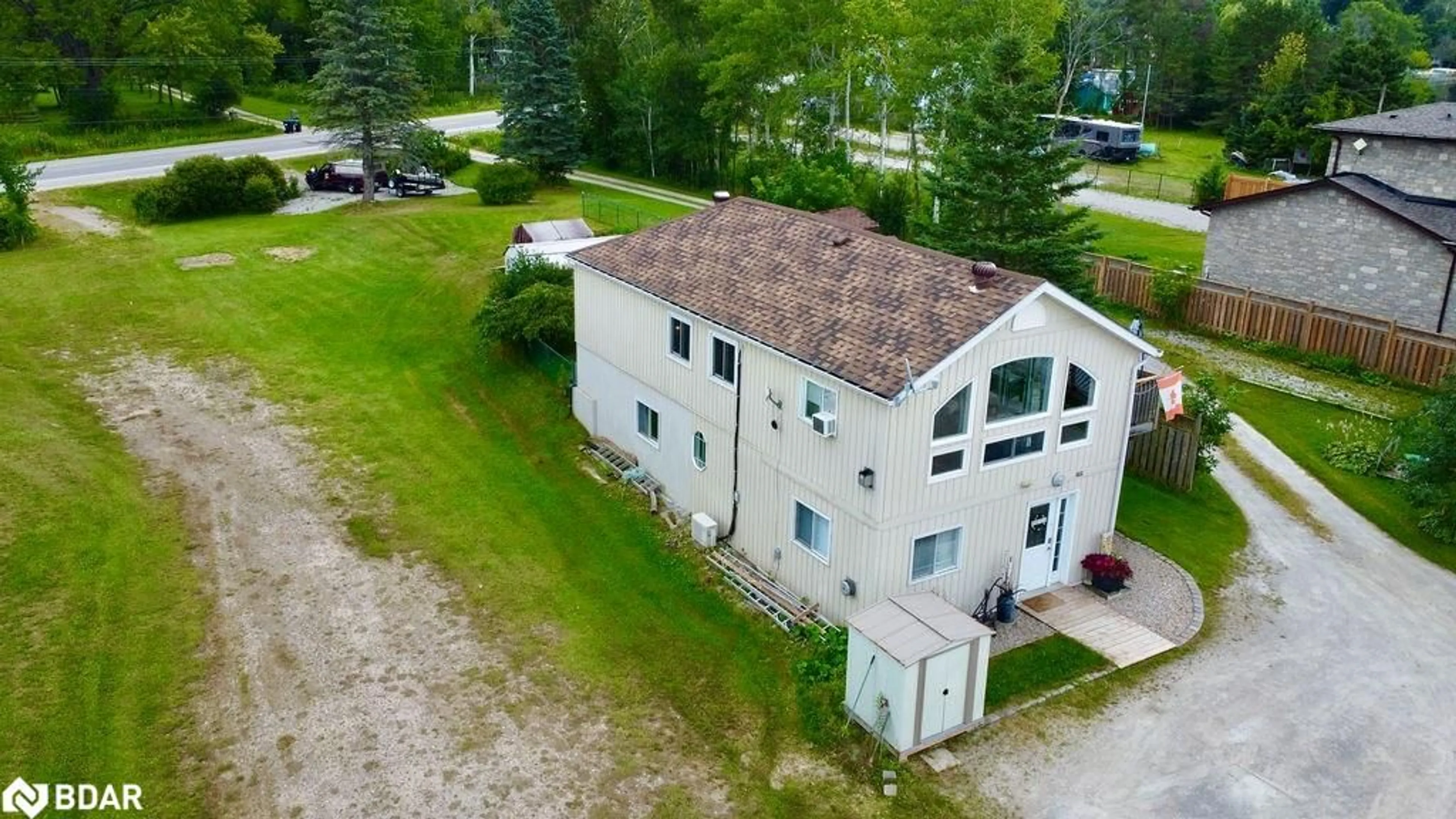 A pic from outside/outdoor area/front of a property/back of a property/a pic from drone, building for 5632 Penetanguishene Rd, Elmvale Ontario L0L 1P0