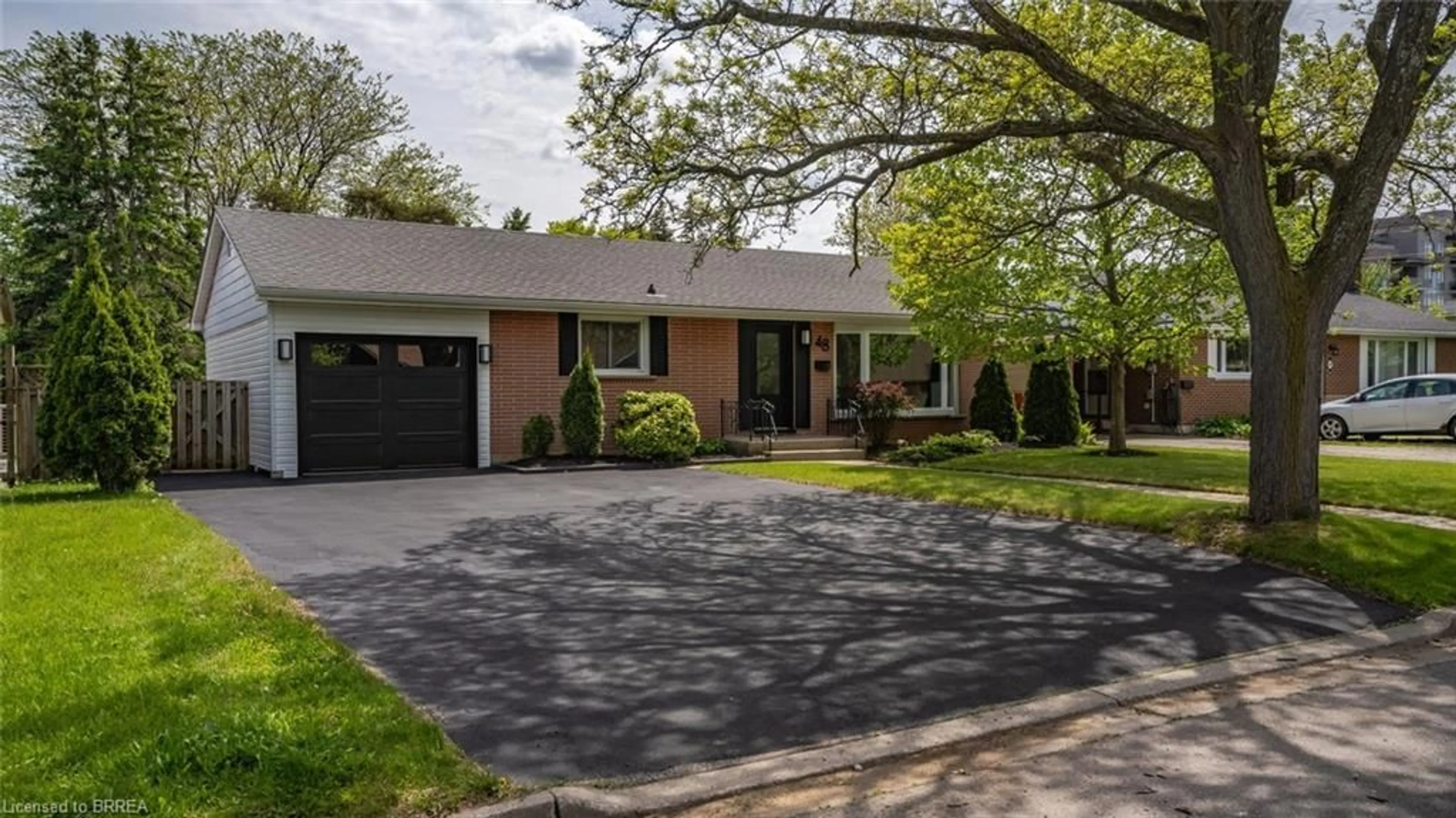 Home with brick exterior material, street for 48 Norman St, Brantford Ontario N3R 2Y2