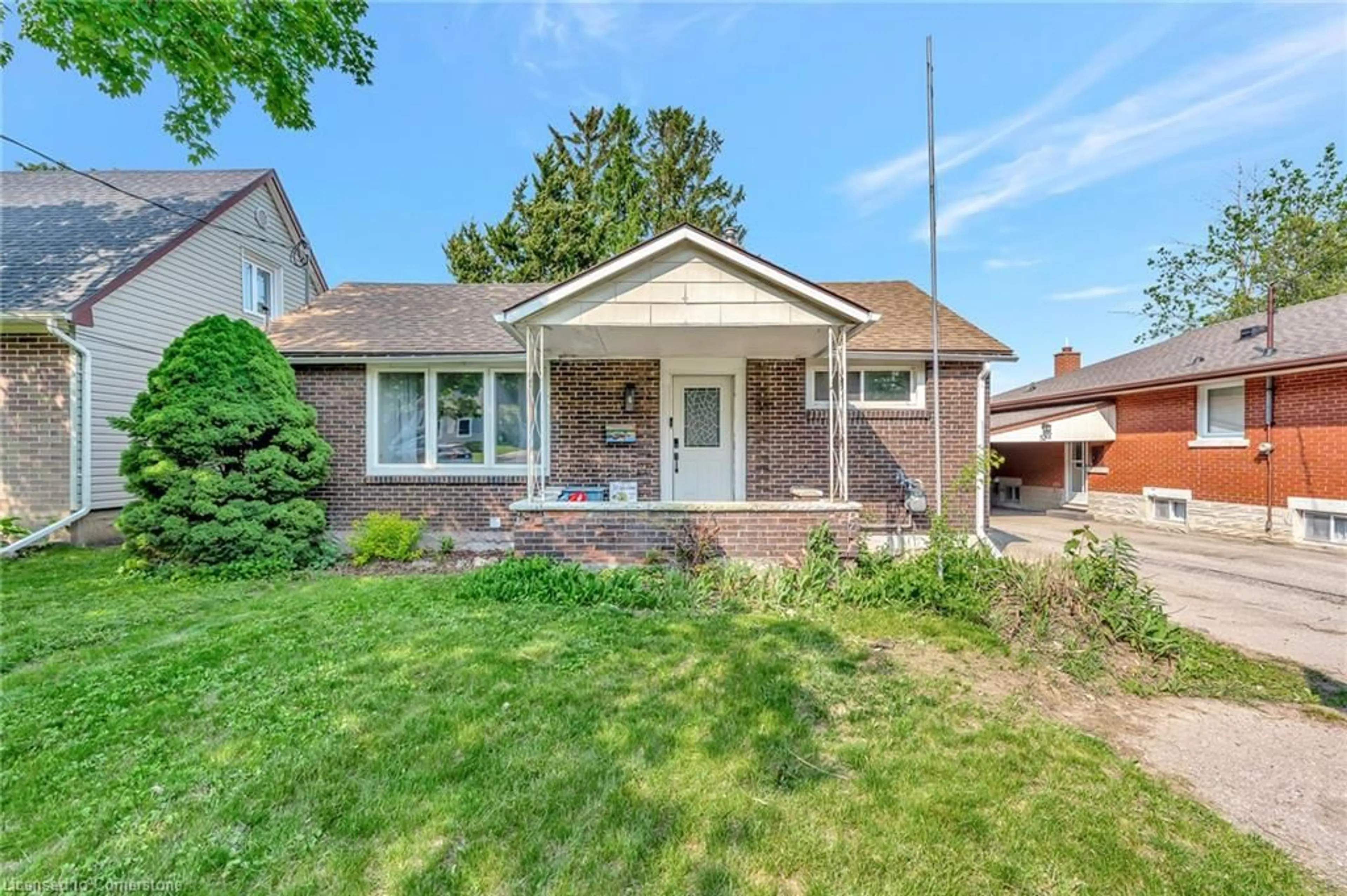 Home with brick exterior material, street for 48 Belmont Ave, Kitchener Ontario N2M 4B9