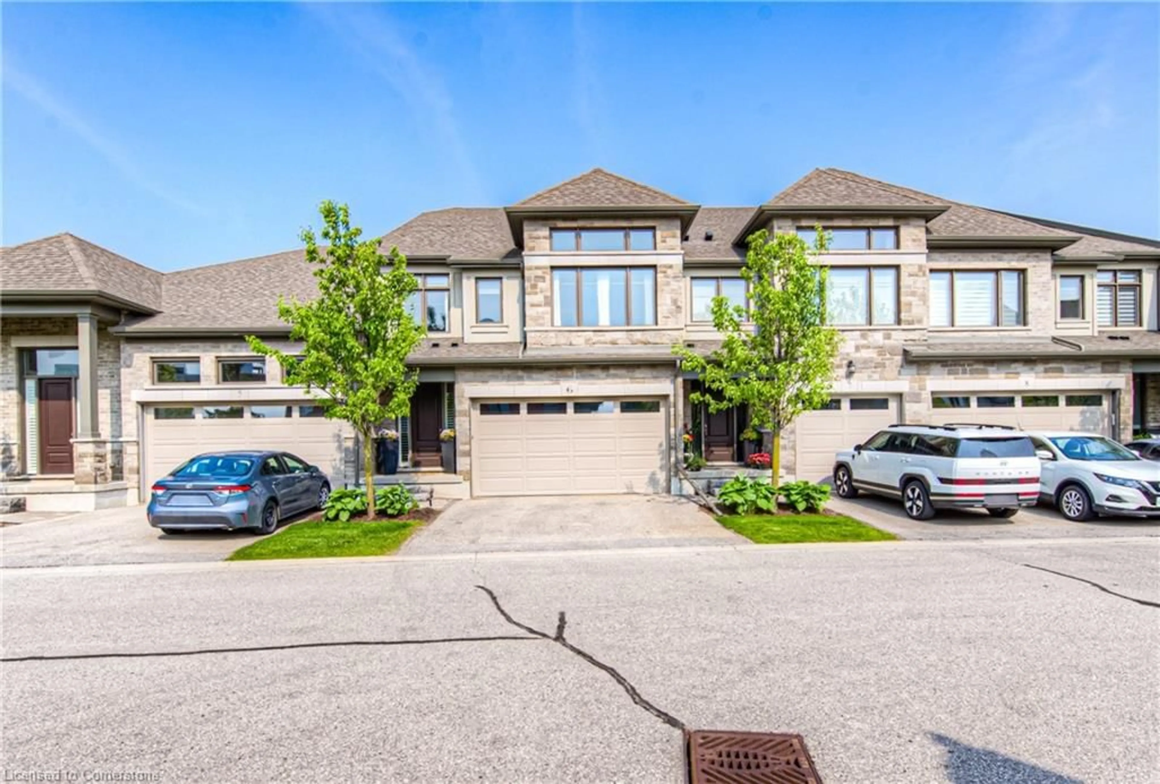 A pic from outside/outdoor area/front of a property/back of a property/a pic from drone, street for 243 Grey Silo Rd #6, Waterloo Ontario N2J 4G8