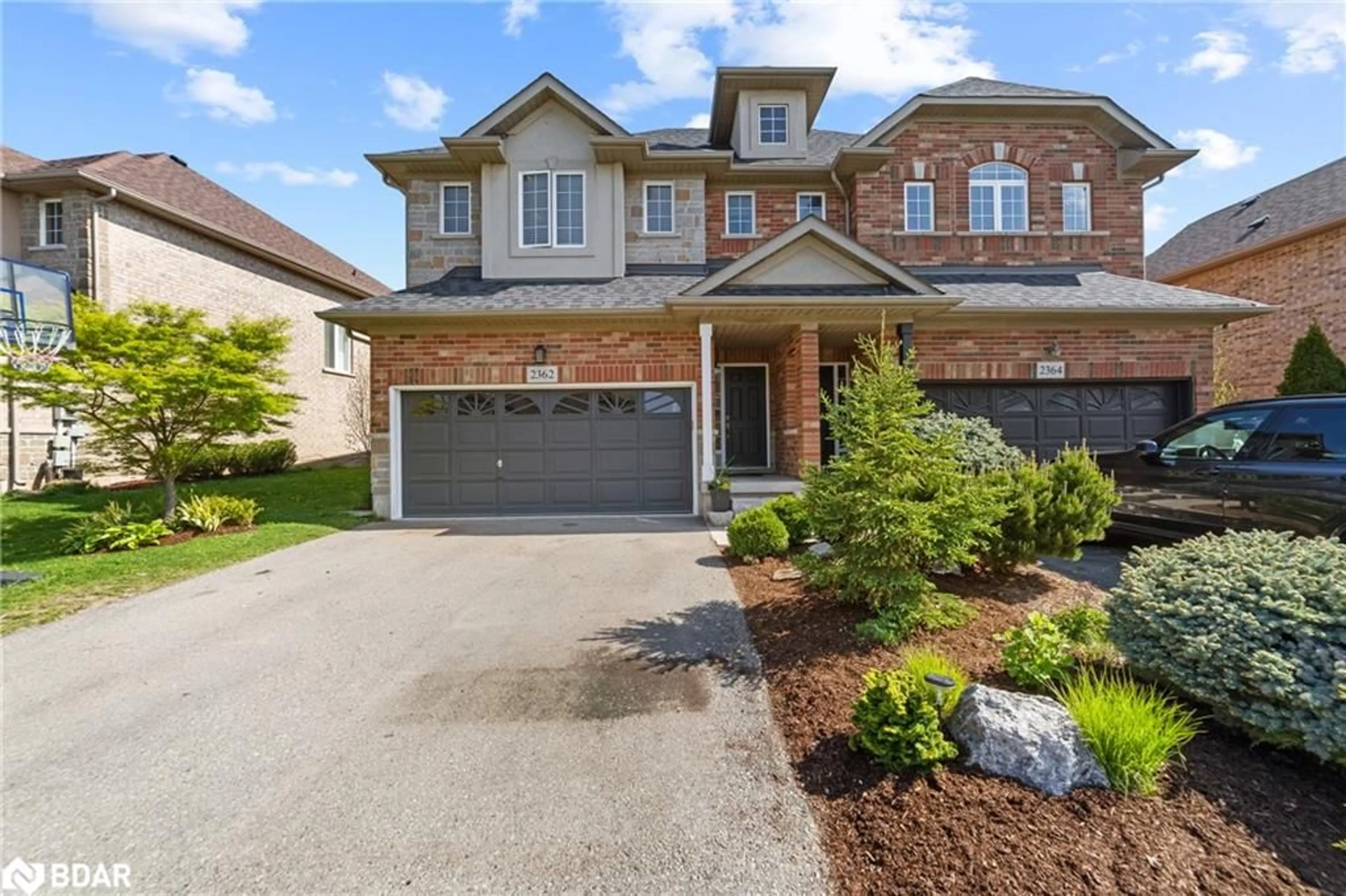 Home with brick exterior material, street for 2362 Stone Glen Cres, Oakville Ontario L6M 0C7