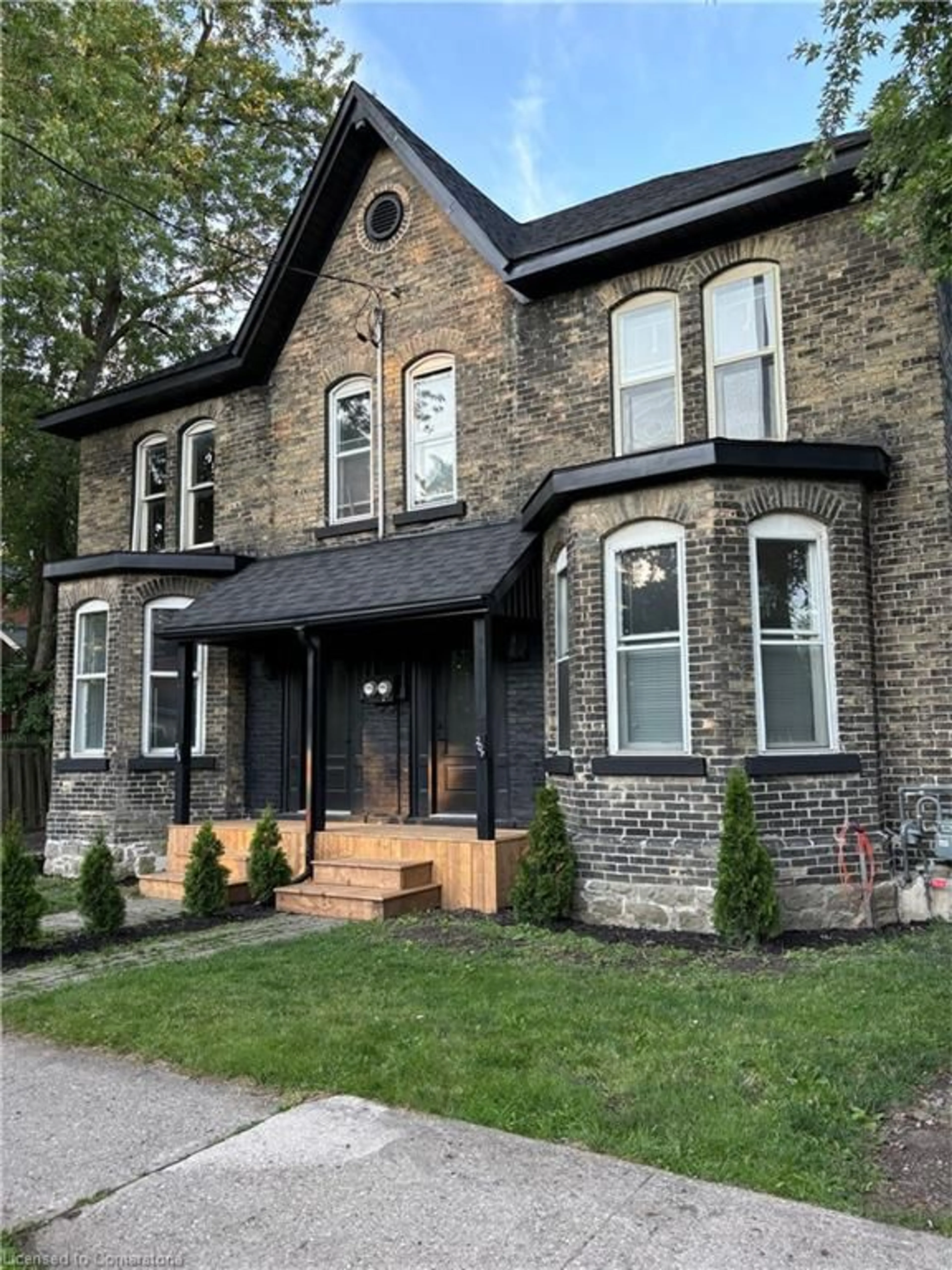 Home with brick exterior material, street for 207 Nile St #205, Stratford Ontario N5A 4E7