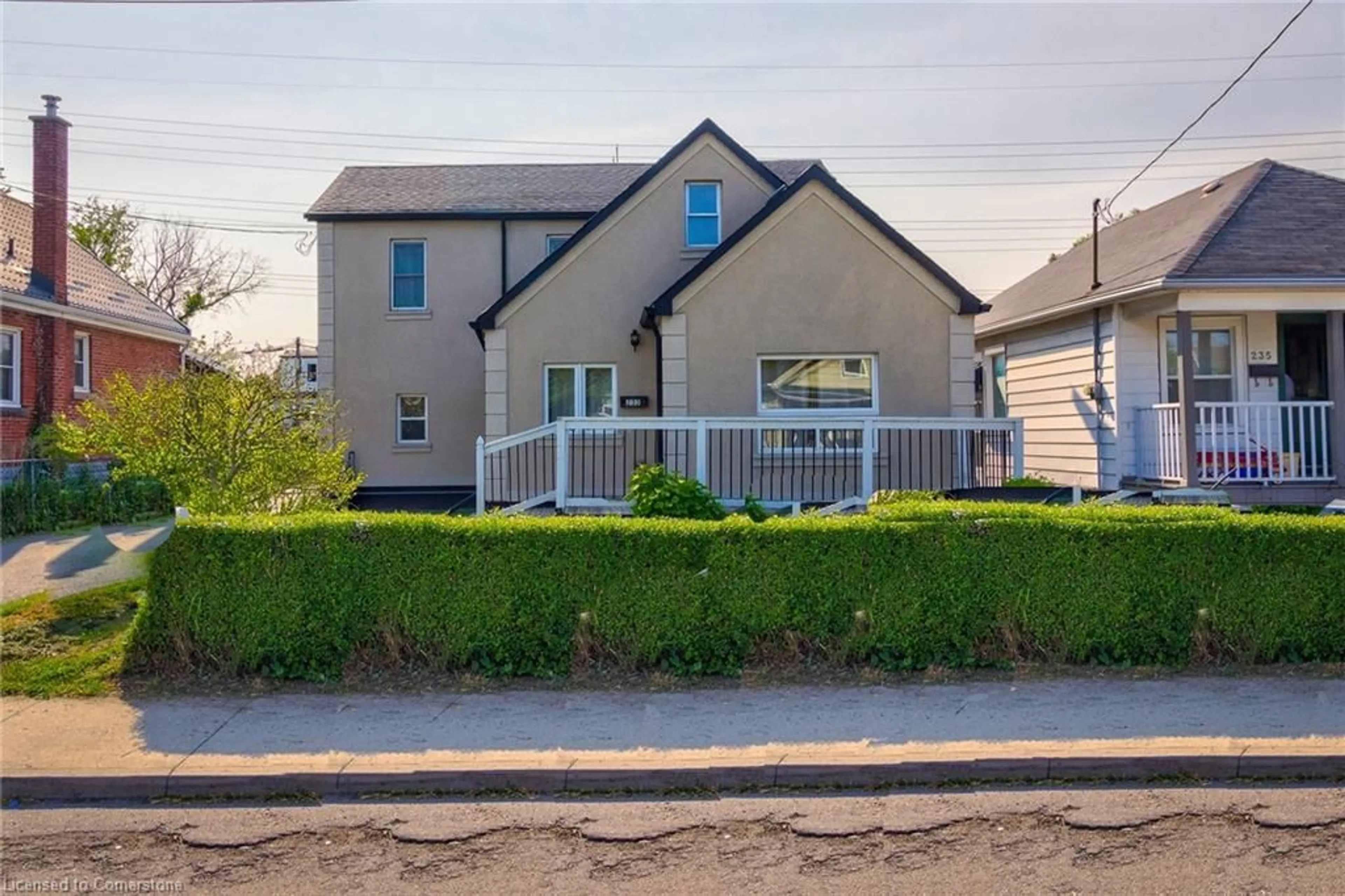 Home with vinyl exterior material, street for 233 Normanhurst Ave, Hamilton Ontario L8N 5N1