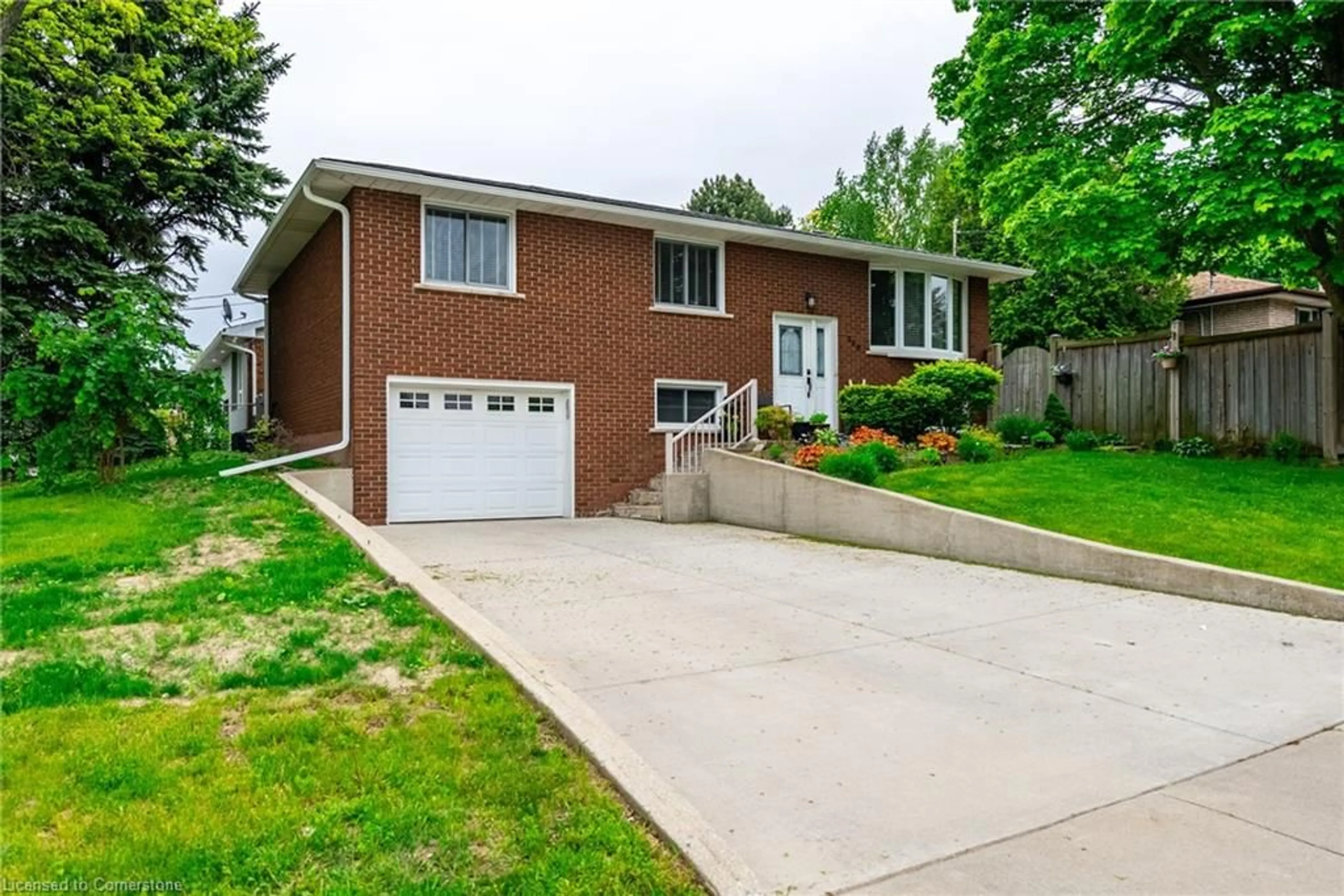 Home with brick exterior material, street for 389 Hawkridge Ave, Hamilton Ontario L9C 5Z6