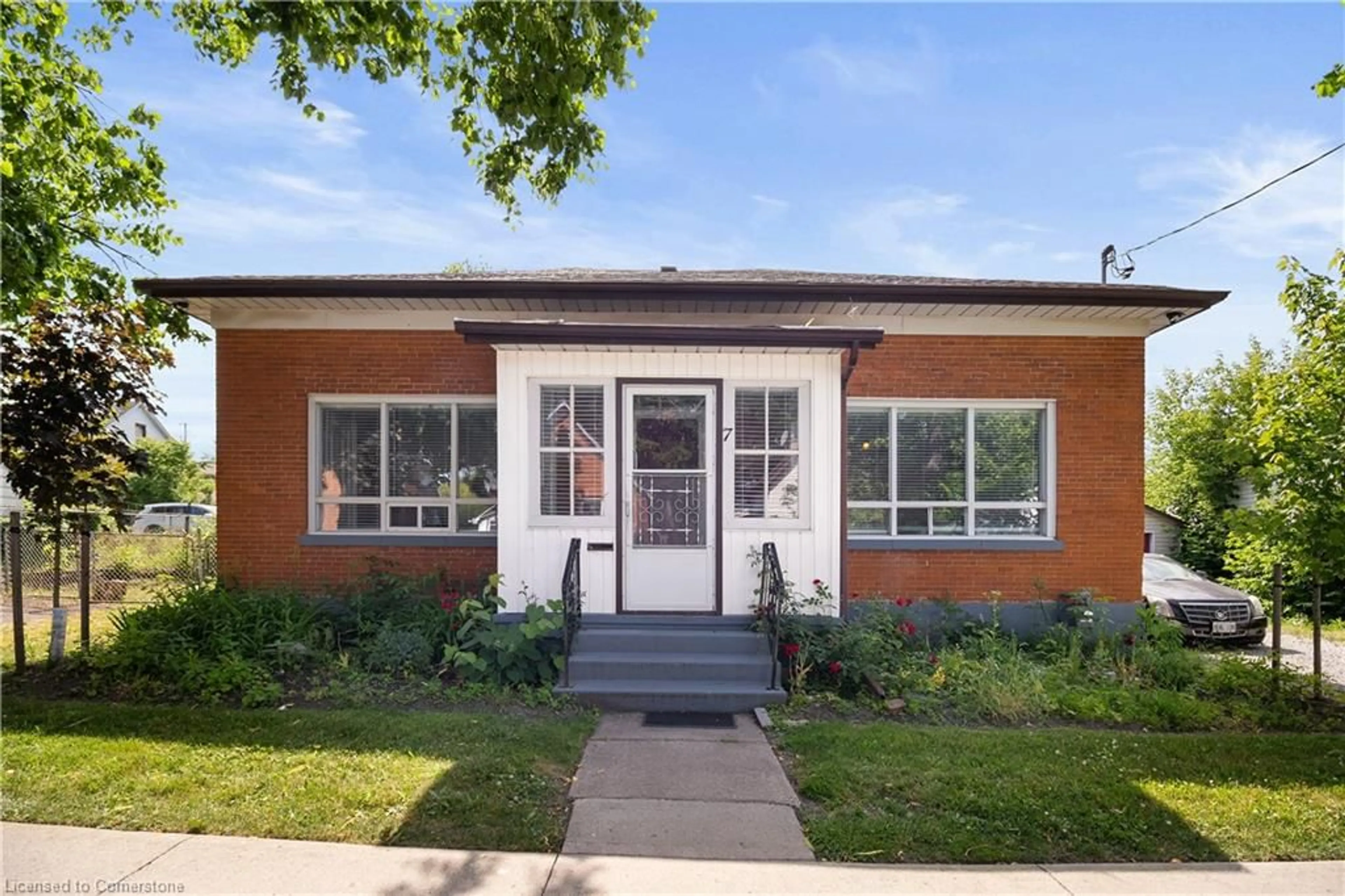 Home with brick exterior material, street for 7 Tasker St, St. Catharines Ontario L2R 3Z7