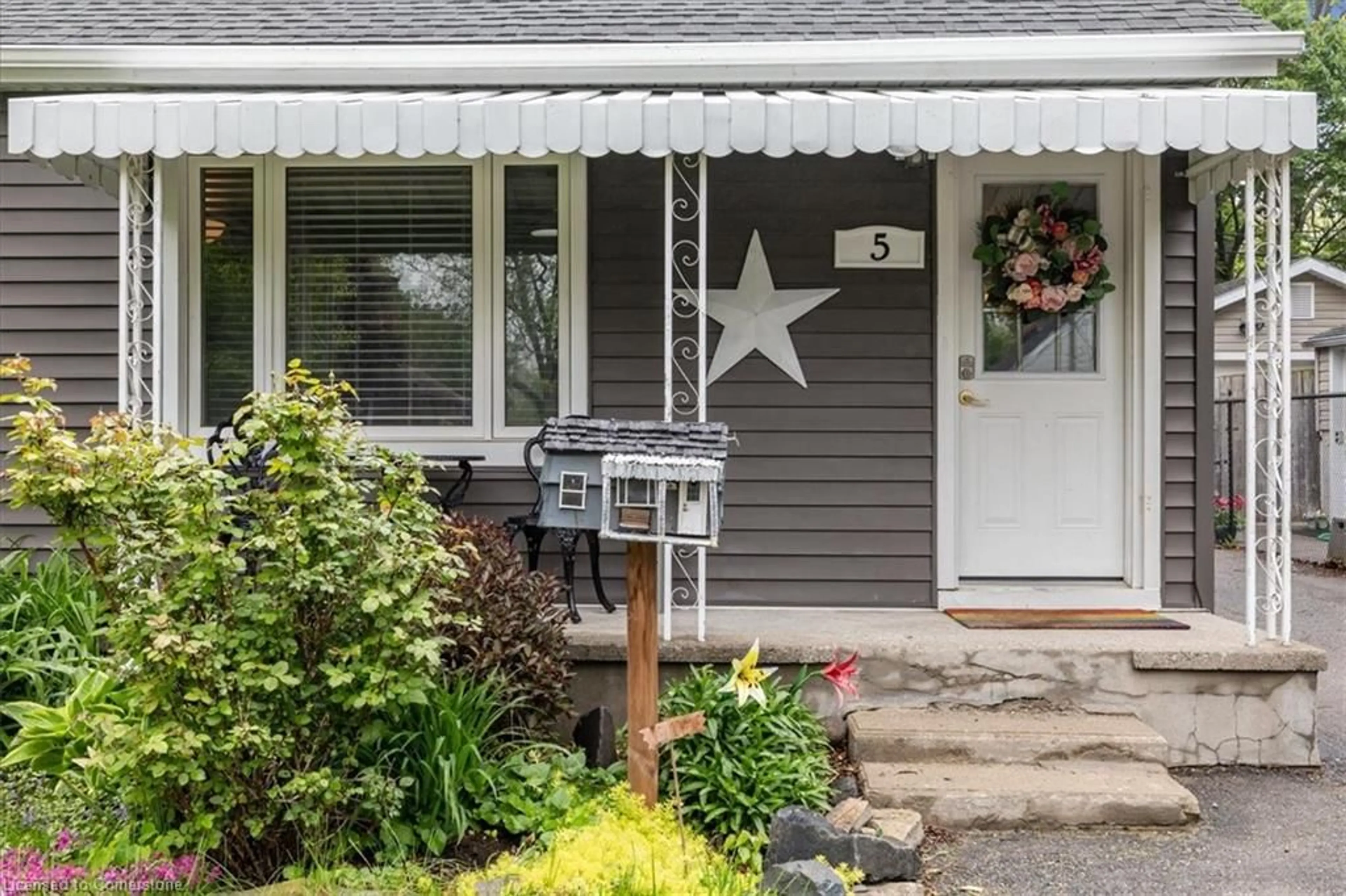 Home with vinyl exterior material, street for 5 Vimy St, Cambridge Ontario N1R 4N5