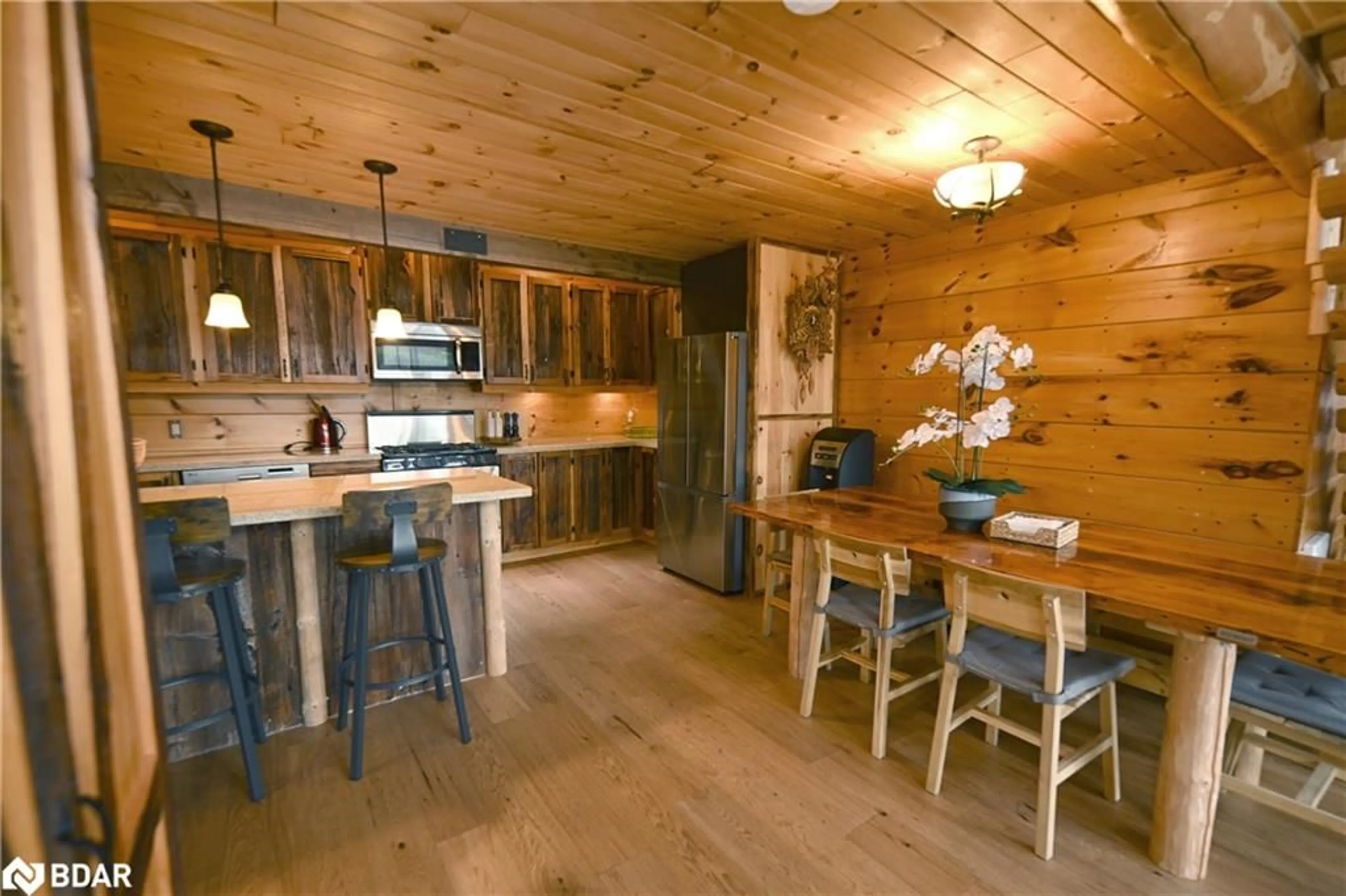 Rustic kitchen, wood/laminate floor for 63 Rouff Road, Trout Creek Ontario P0H 2L0