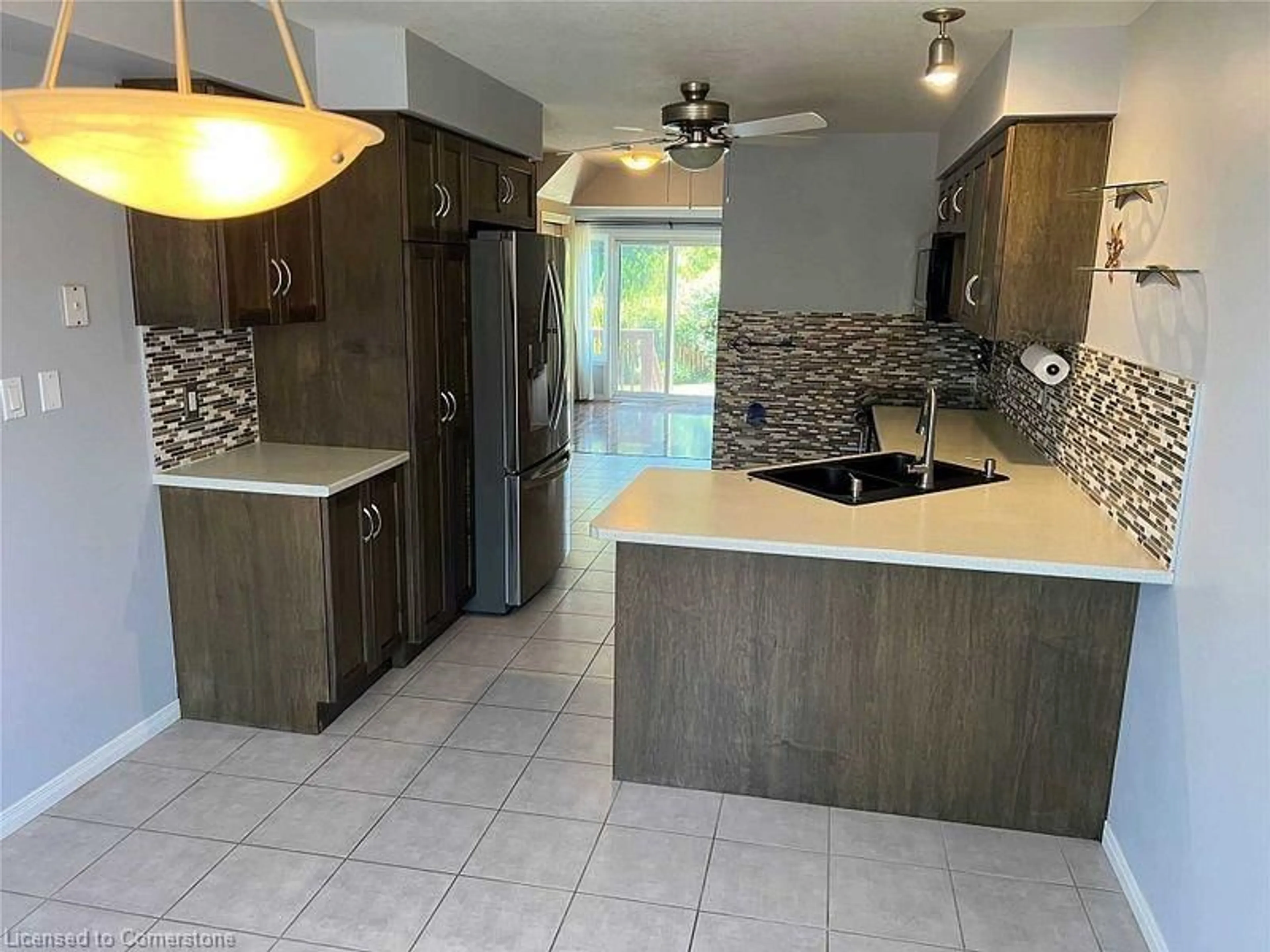 Open concept kitchen, ceramic/tile floor for 305 Briarmeadow Dr #9, Kitchener Ontario N2A 4K9
