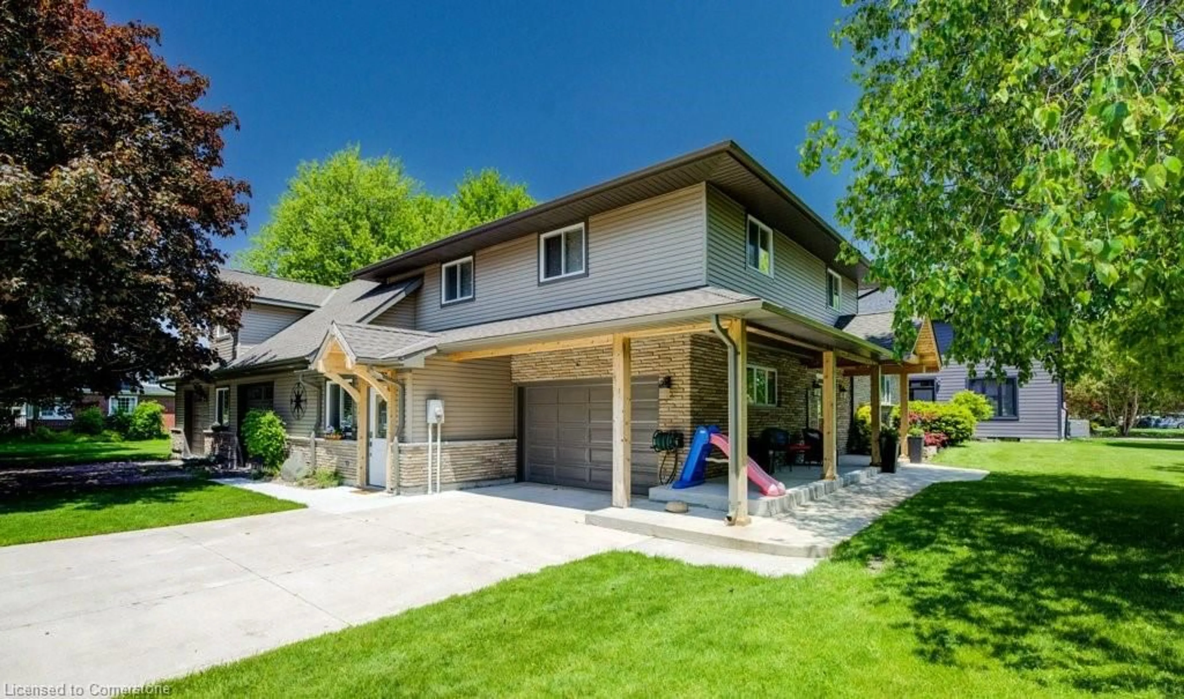 Home with brick exterior material, street for 194 Queen St, Atwood Ontario N0G 1B0