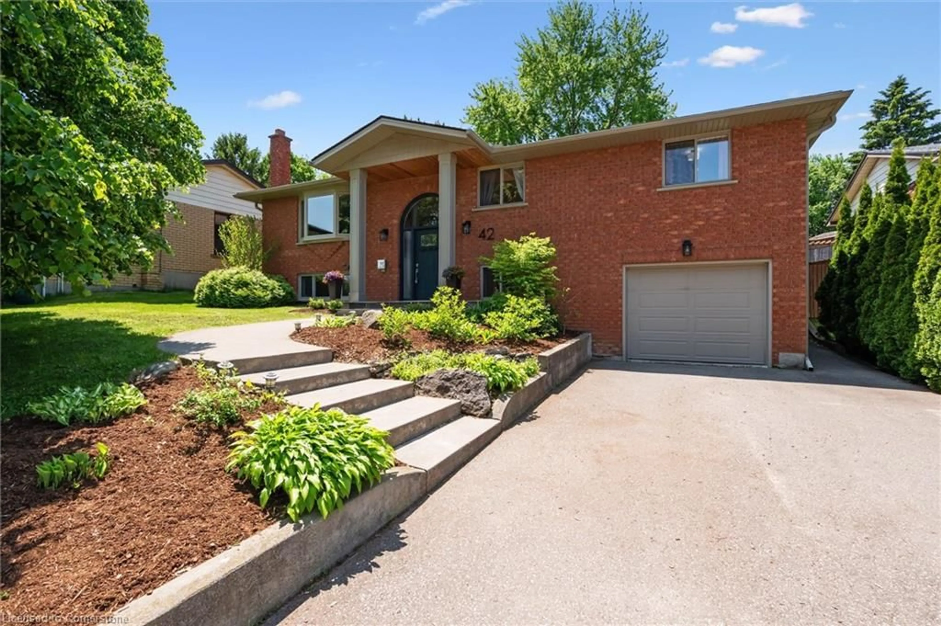 Home with brick exterior material, street for 42 Leslie Ave, Cambridge Ontario N1S 4N7