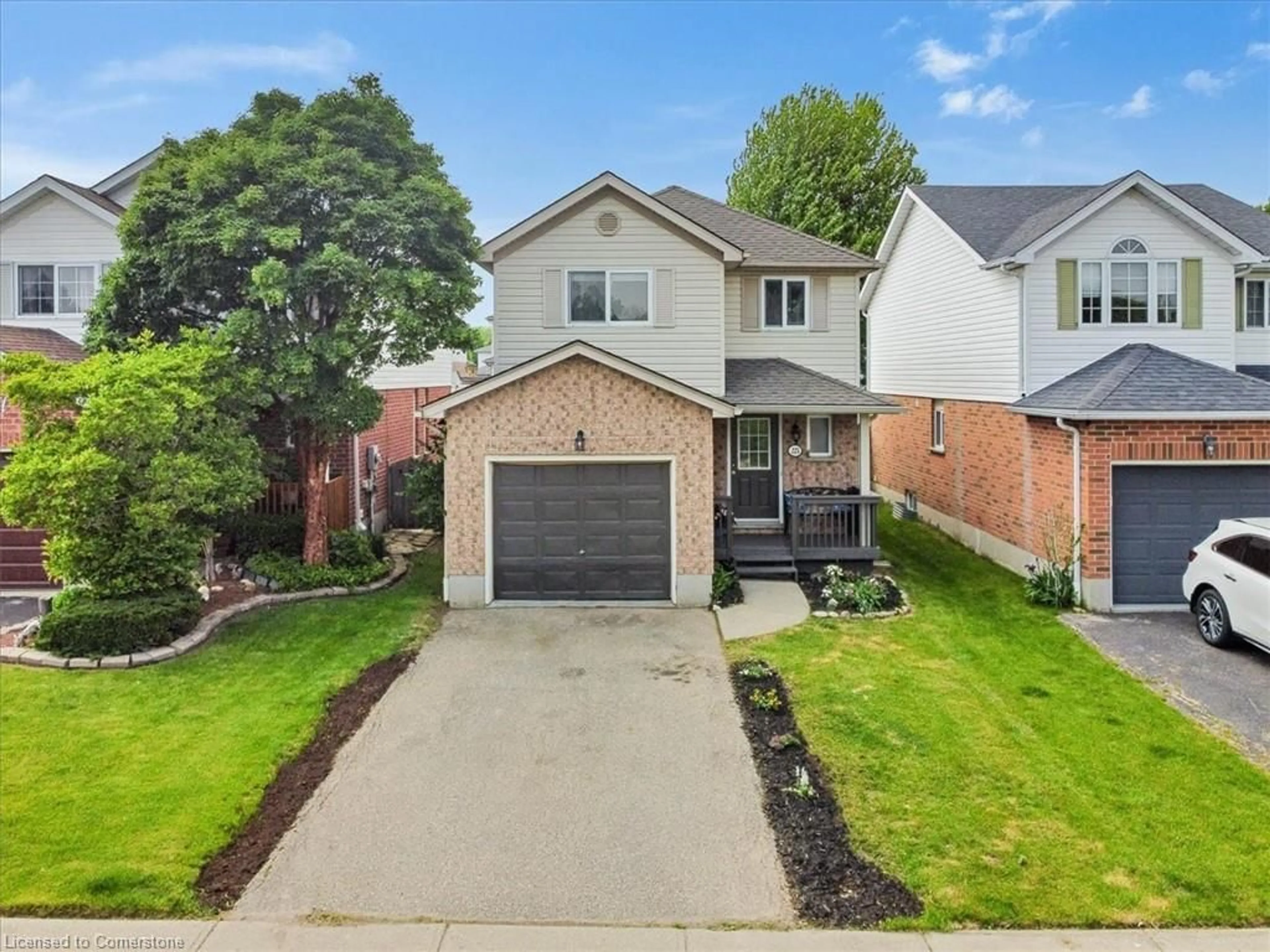 Home with brick exterior material, street for 225 Pastern Trail, Waterloo Ontario N2K 3X4