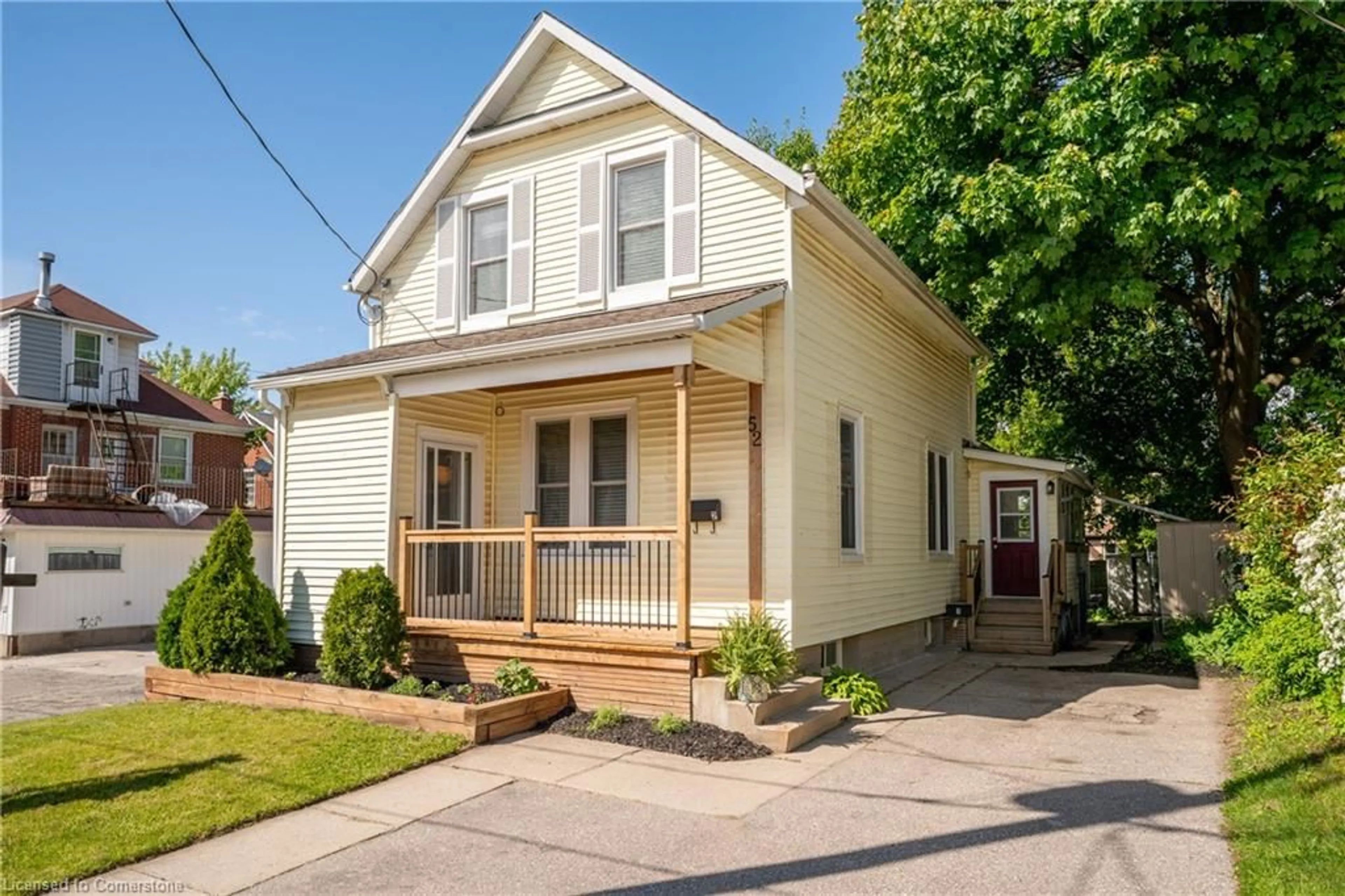 Home with vinyl exterior material, street for 52 Henry St, Kitchener Ontario N2G 1P3