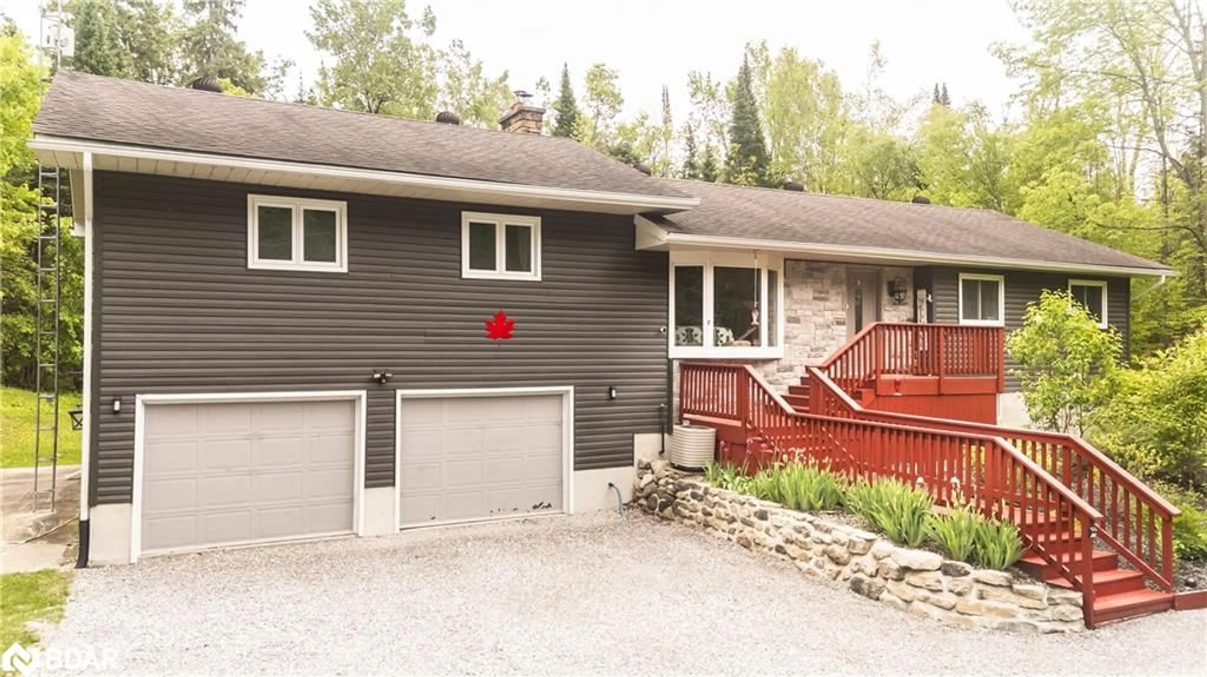 Home with vinyl exterior material, street for 7 Juniper Isle Rd, Coboconk Ontario K0M 1N0