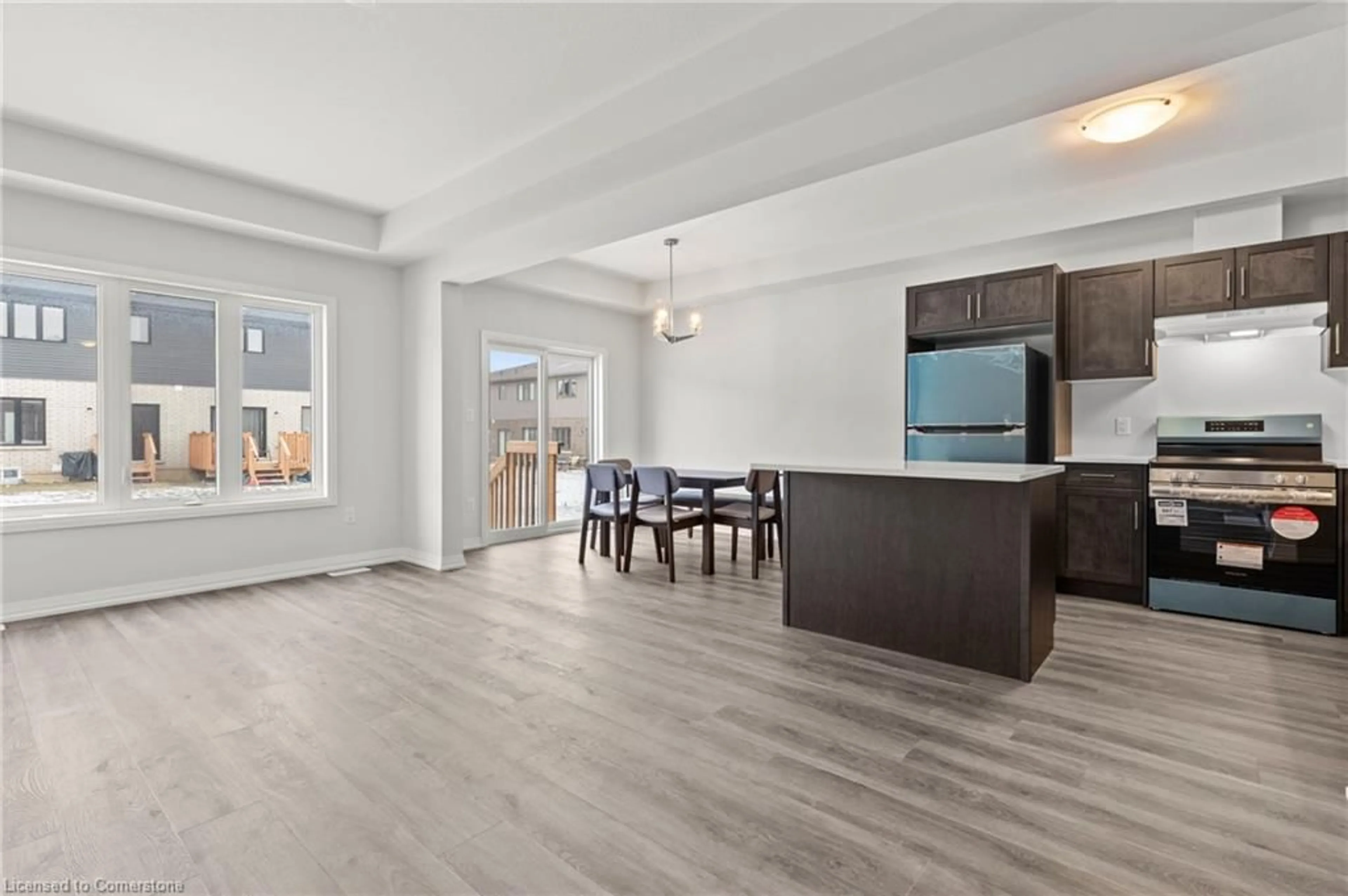 Open concept kitchen, wood/laminate floor for 103 Acacia Rd, Fonthill Ontario L0S 1E1