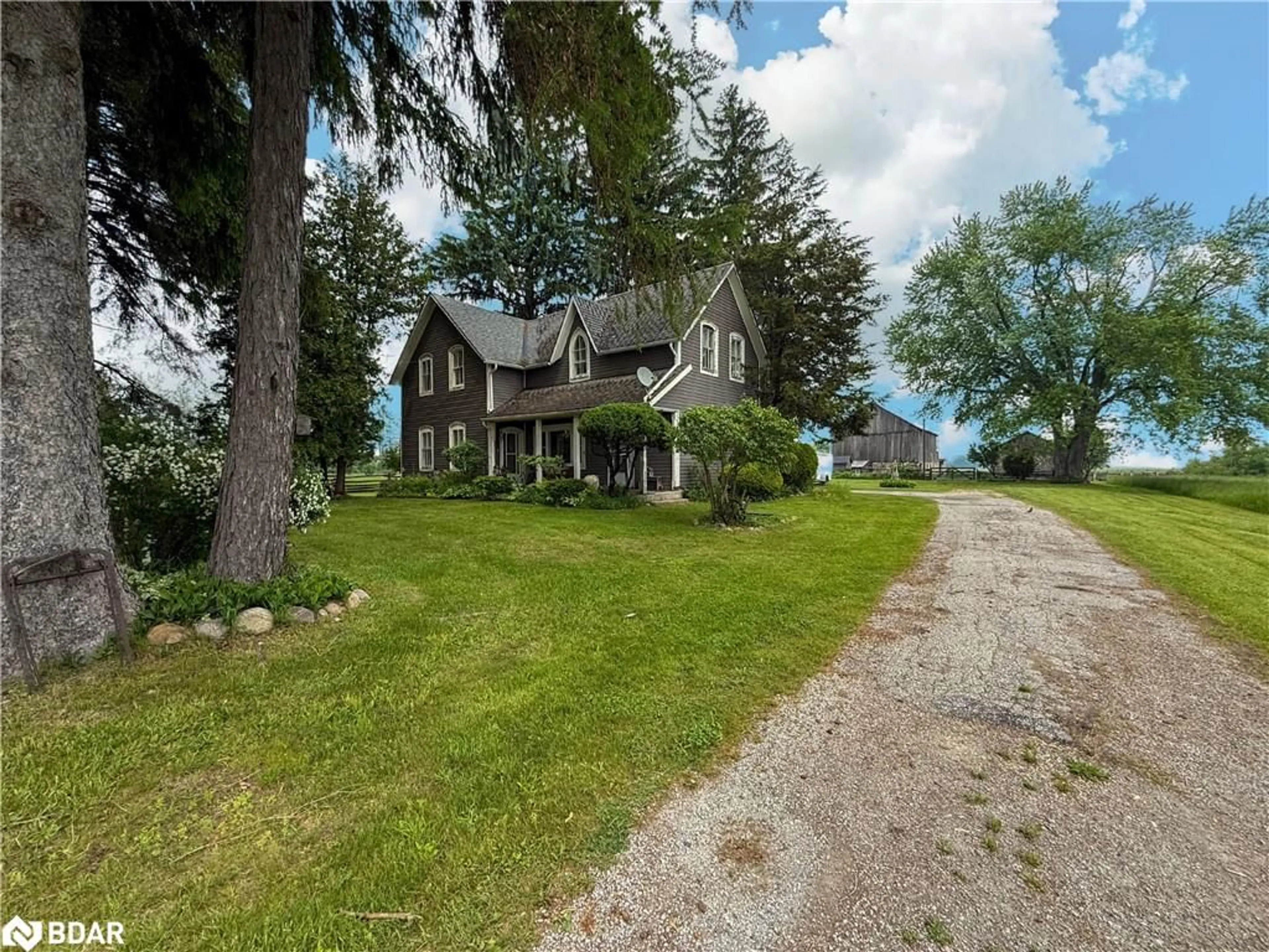 A pic from outside/outdoor area/front of a property/back of a property/a pic from drone, street for 10187 County Rd 10 Rd, New Lowell Ontario L0M 1N0