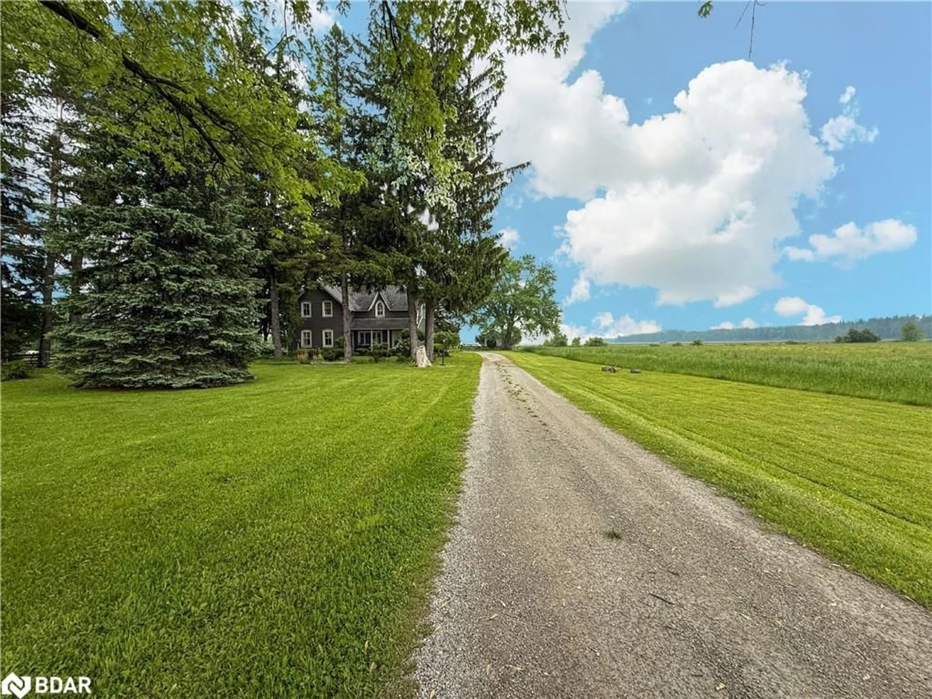 A pic from outside/outdoor area/front of a property/back of a property/a pic from drone, street for 10187 County Rd 10 Rd, New Lowell Ontario L0M 1N0