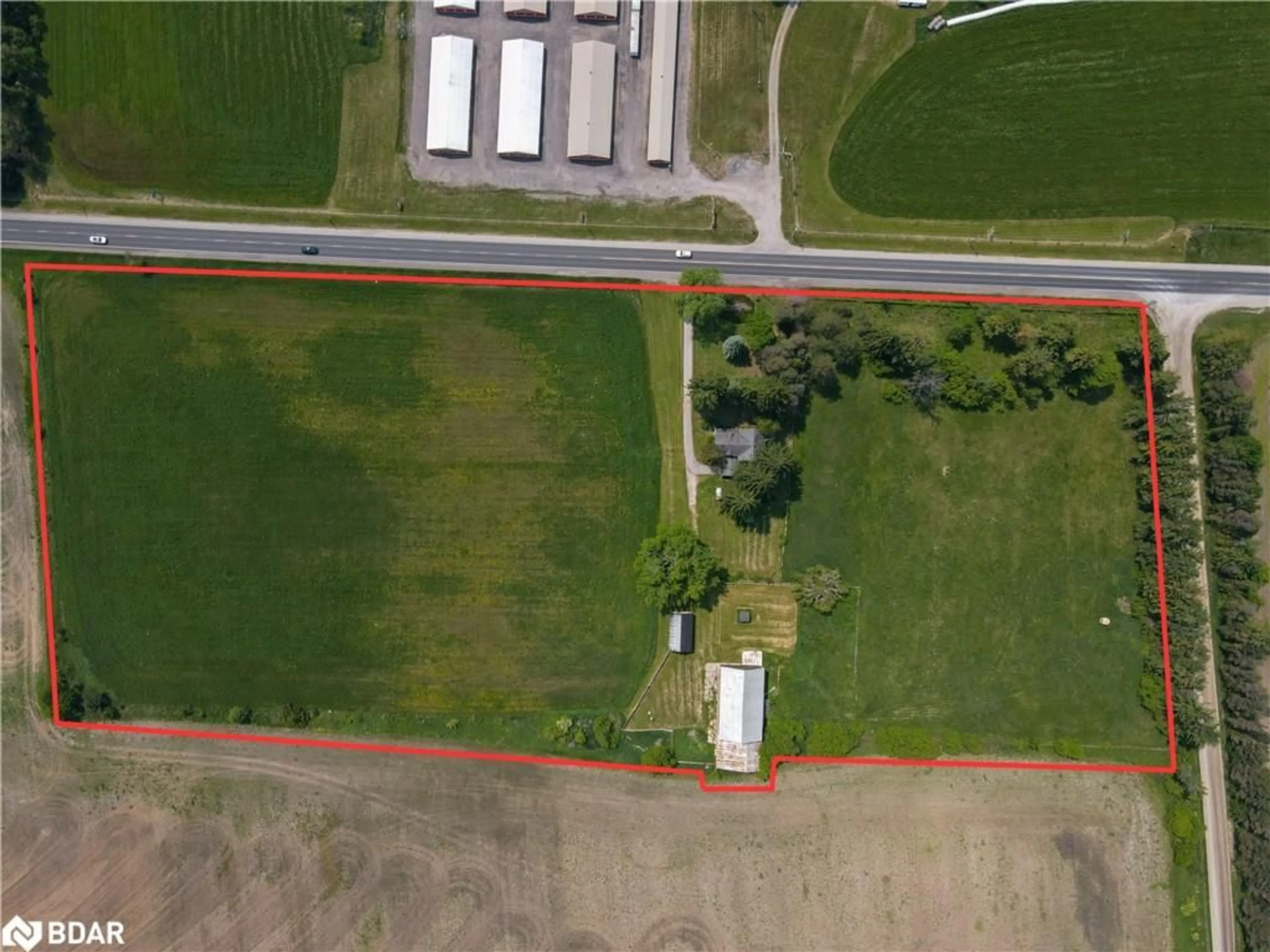 A pic from outside/outdoor area/front of a property/back of a property/a pic from drone, building for 10187 County Rd 10 Rd, New Lowell Ontario L0M 1N0
