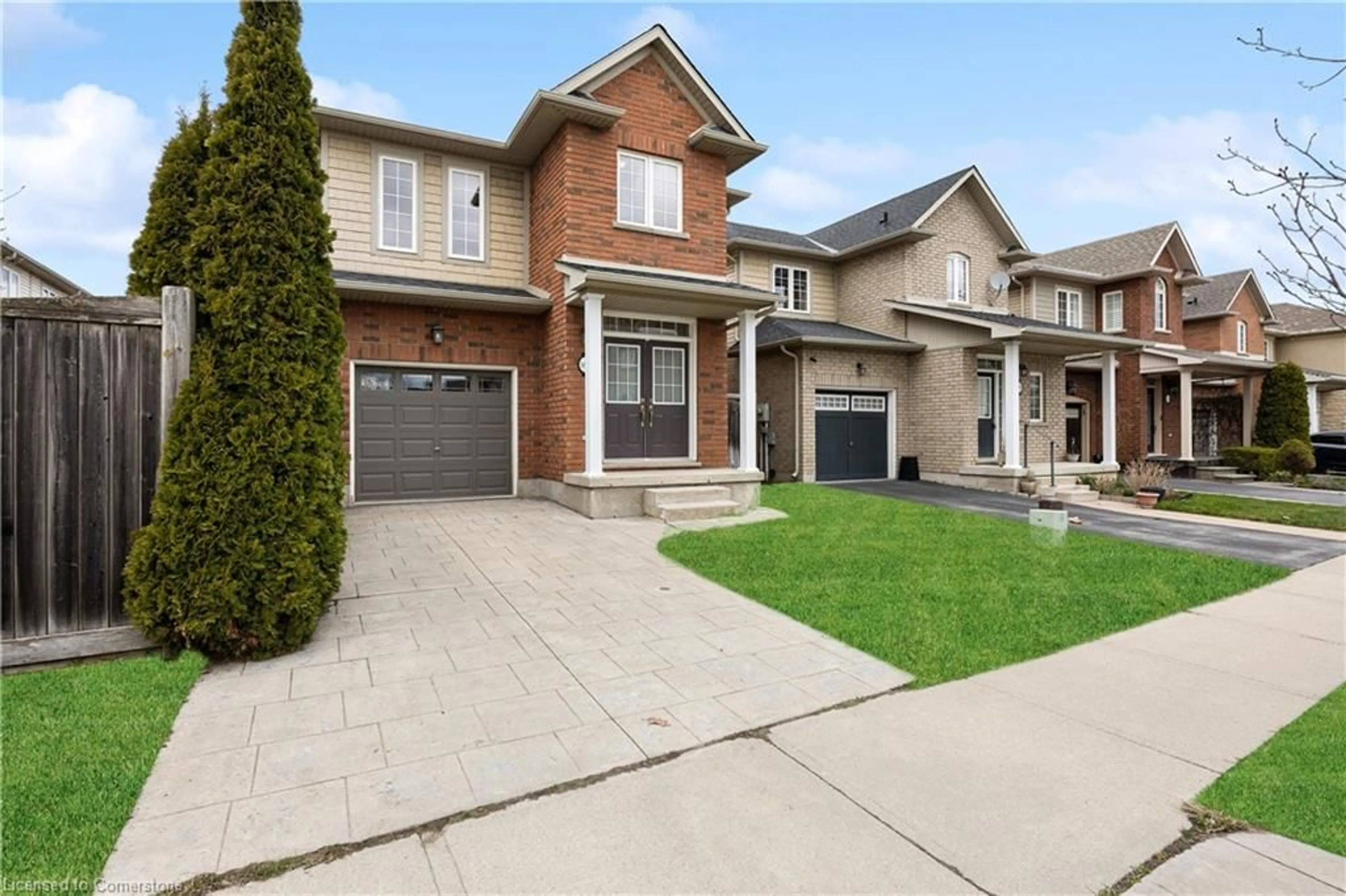 Home with brick exterior material, street for 165 Palacebeach Trail, Hamilton Ontario L8E 0C3