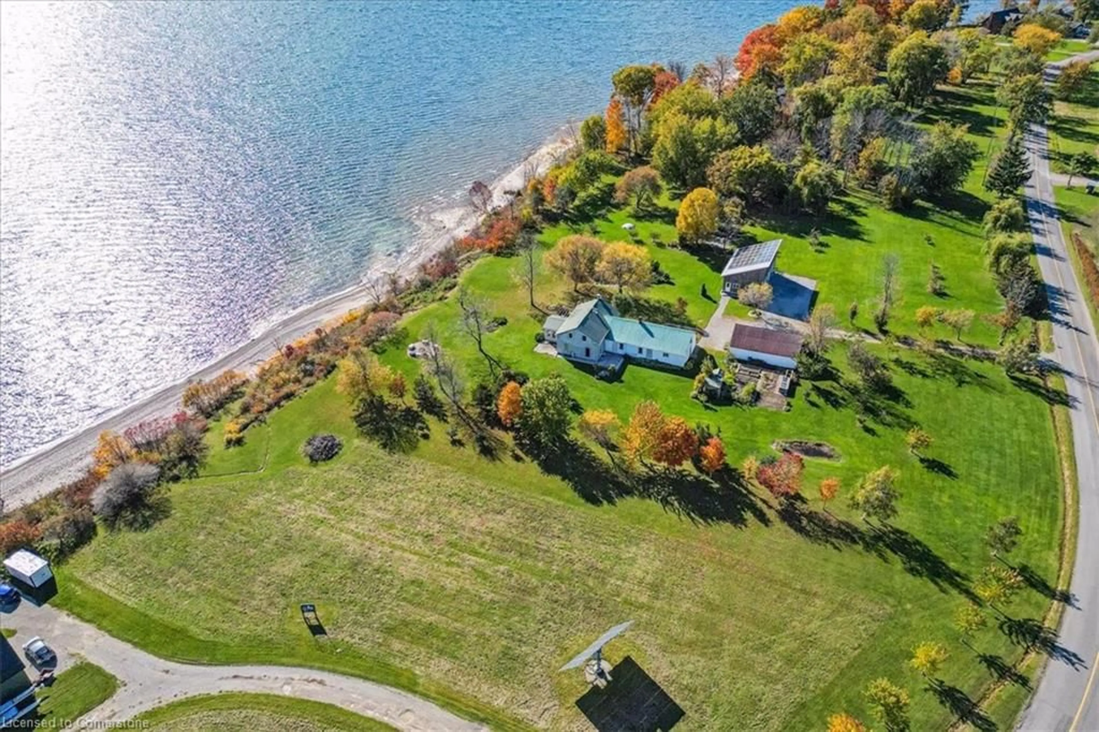 A pic from outside/outdoor area/front of a property/back of a property/a pic from drone, water/lake/river/ocean view for 488 South Coast Dr, Haldimand Ontario N0A 1L0