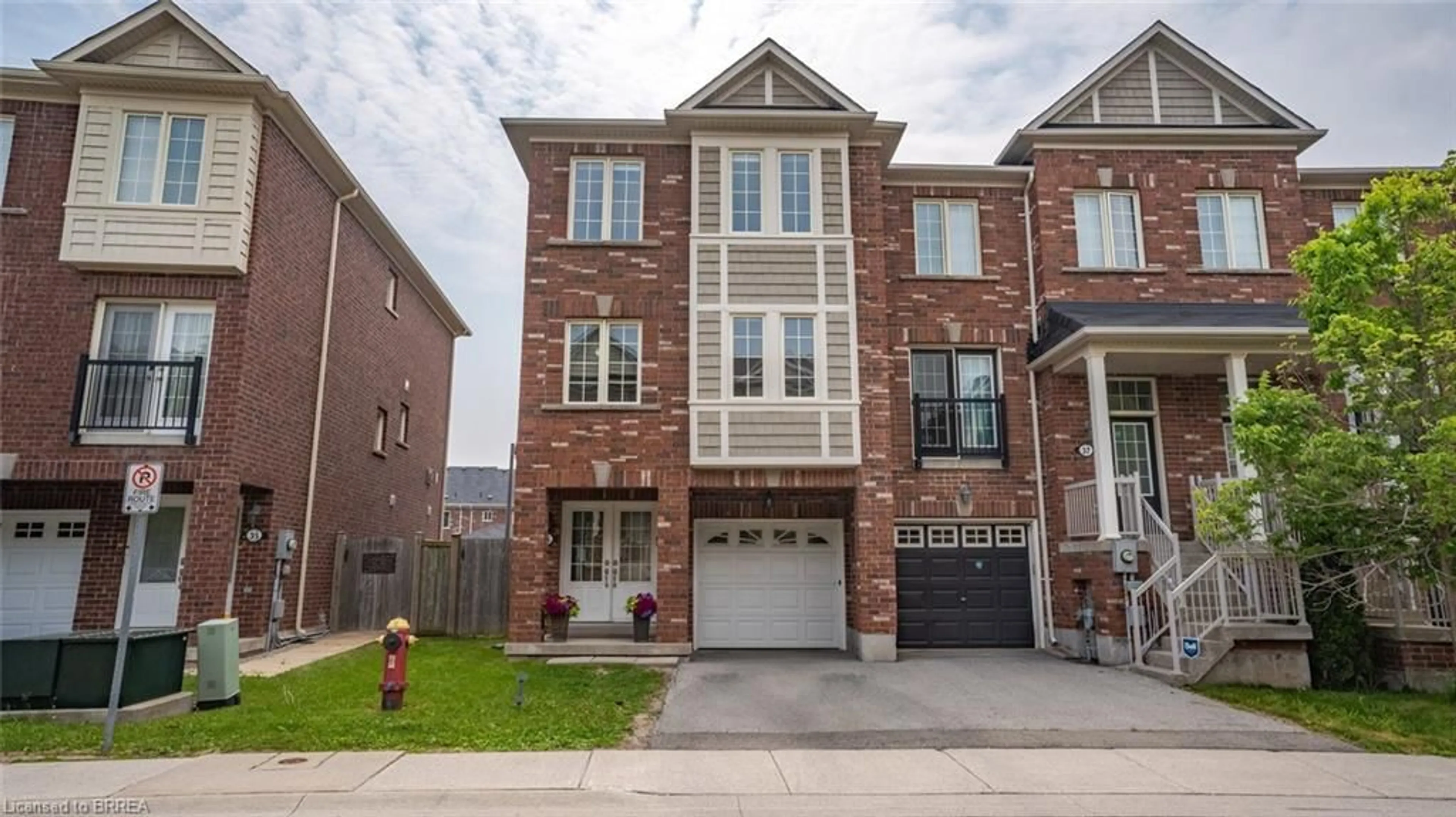 Home with brick exterior material, street for 2186 Fiddlers Way #36, Oakville Ontario L6M 0L5