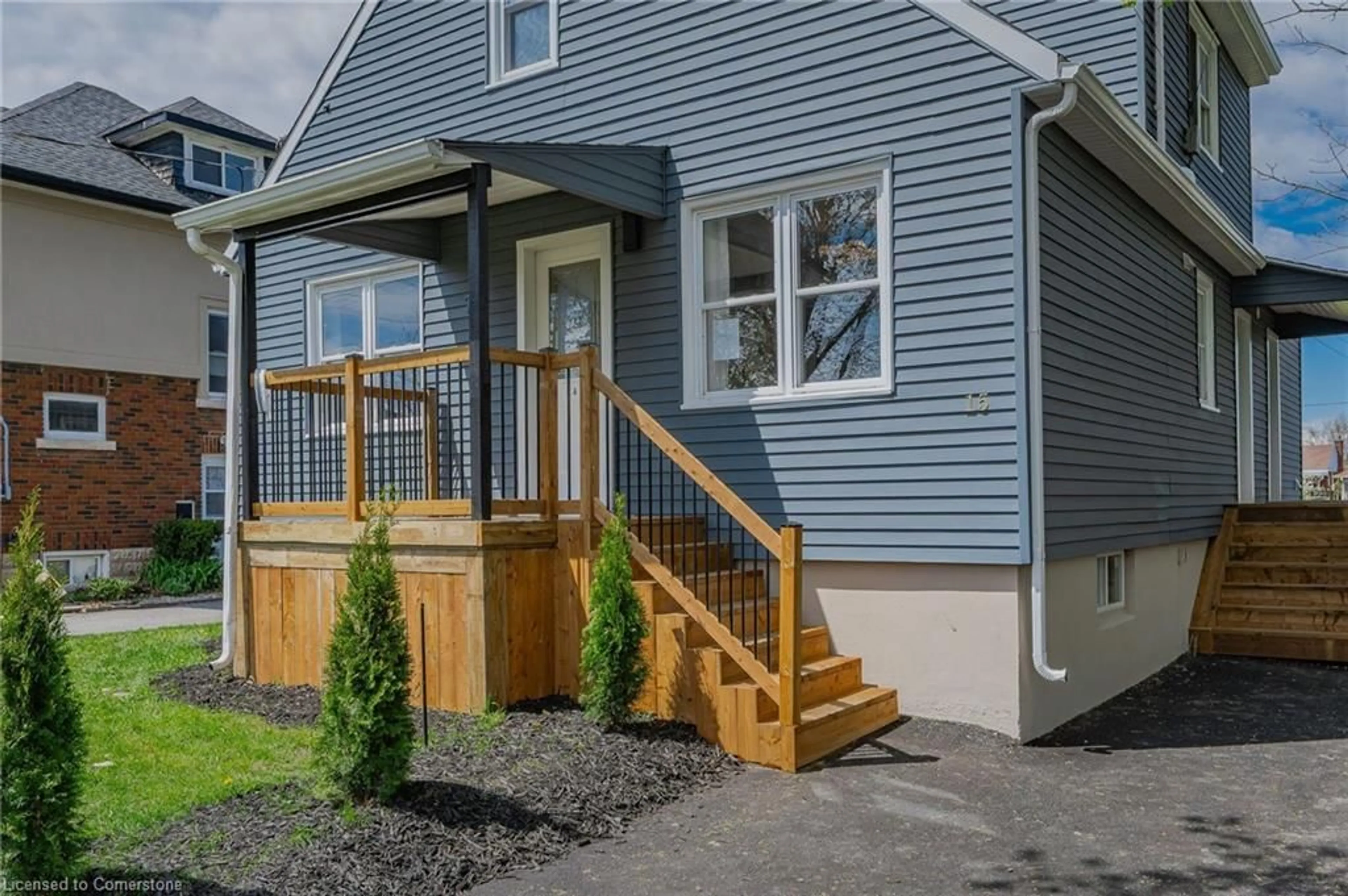 Home with vinyl exterior material, street for 15 Mccain St, Port Colborne Ontario L3K 3P7
