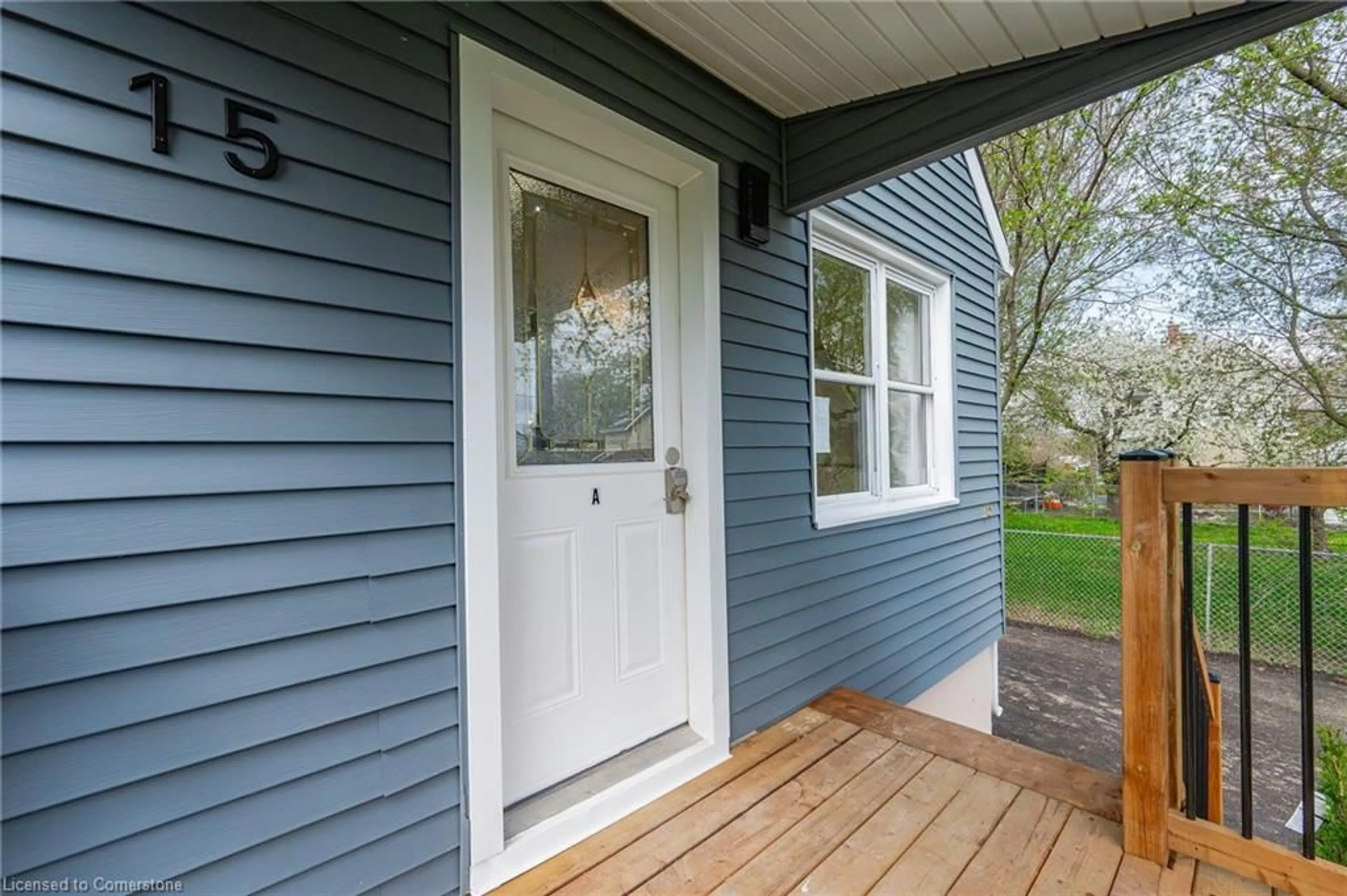 Home with vinyl exterior material, street for 15 Mccain St, Port Colborne Ontario L3K 3P7