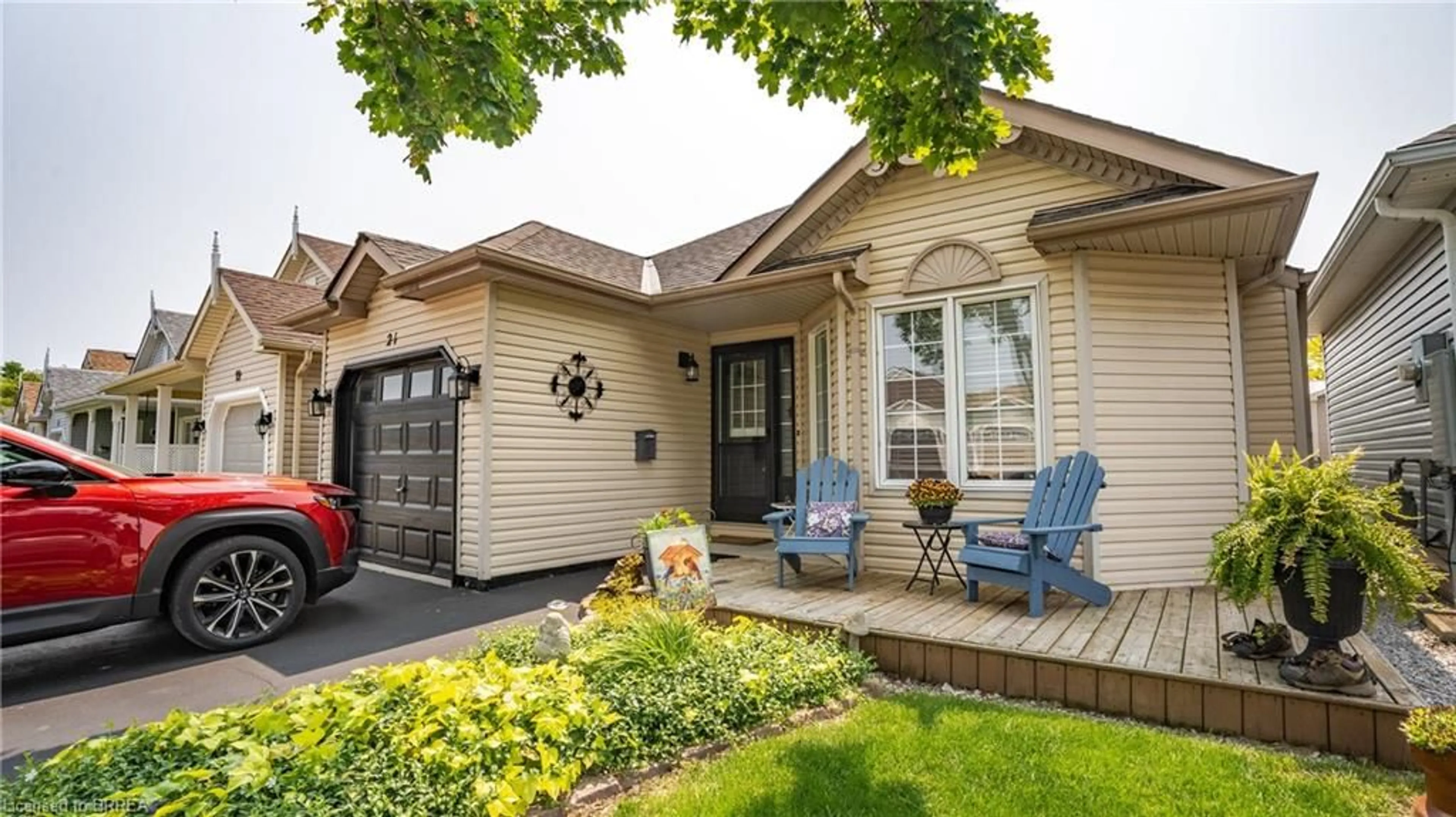 Home with vinyl exterior material, street for 21 Long Point Blvd, Port Rowan Ontario N0E 1M0
