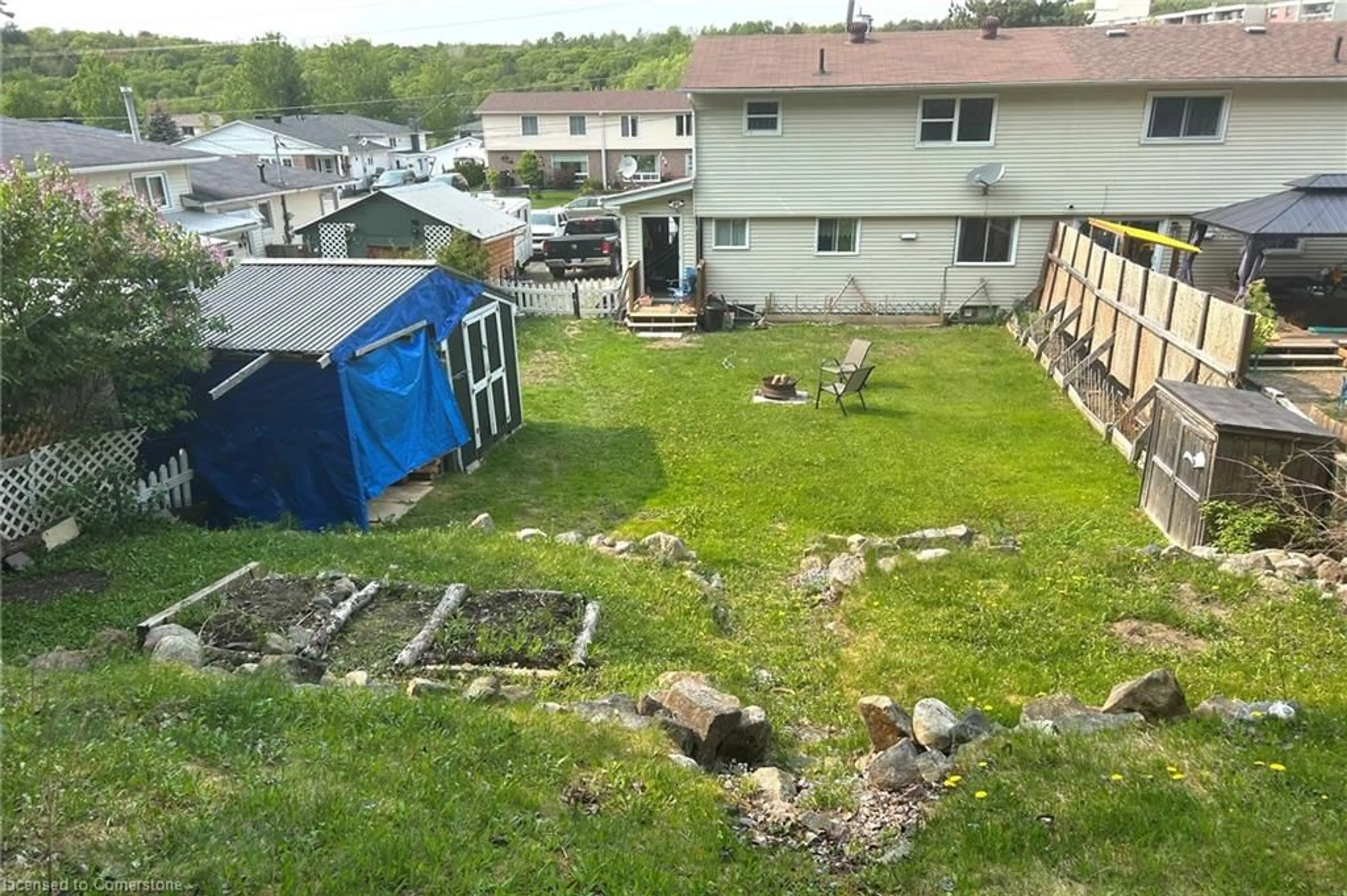 A pic from outside/outdoor area/front of a property/back of a property/a pic from drone, water/lake/river/ocean view for 47 B Washington Cres, Elliot Lake Ontario P5A 2L6