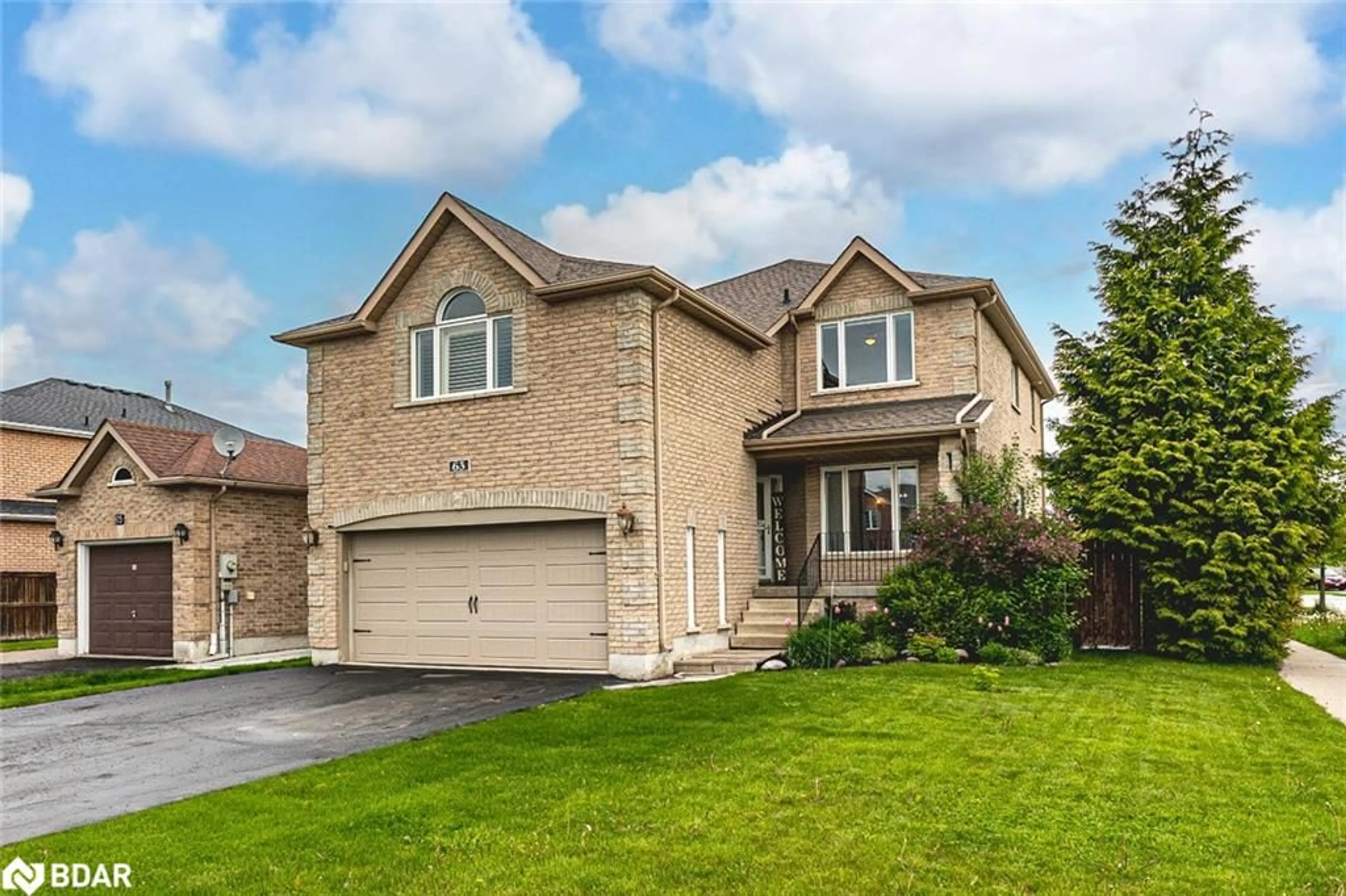 Home with brick exterior material, street for 63 Wismer Ave, Barrie Ontario L4N 9T9