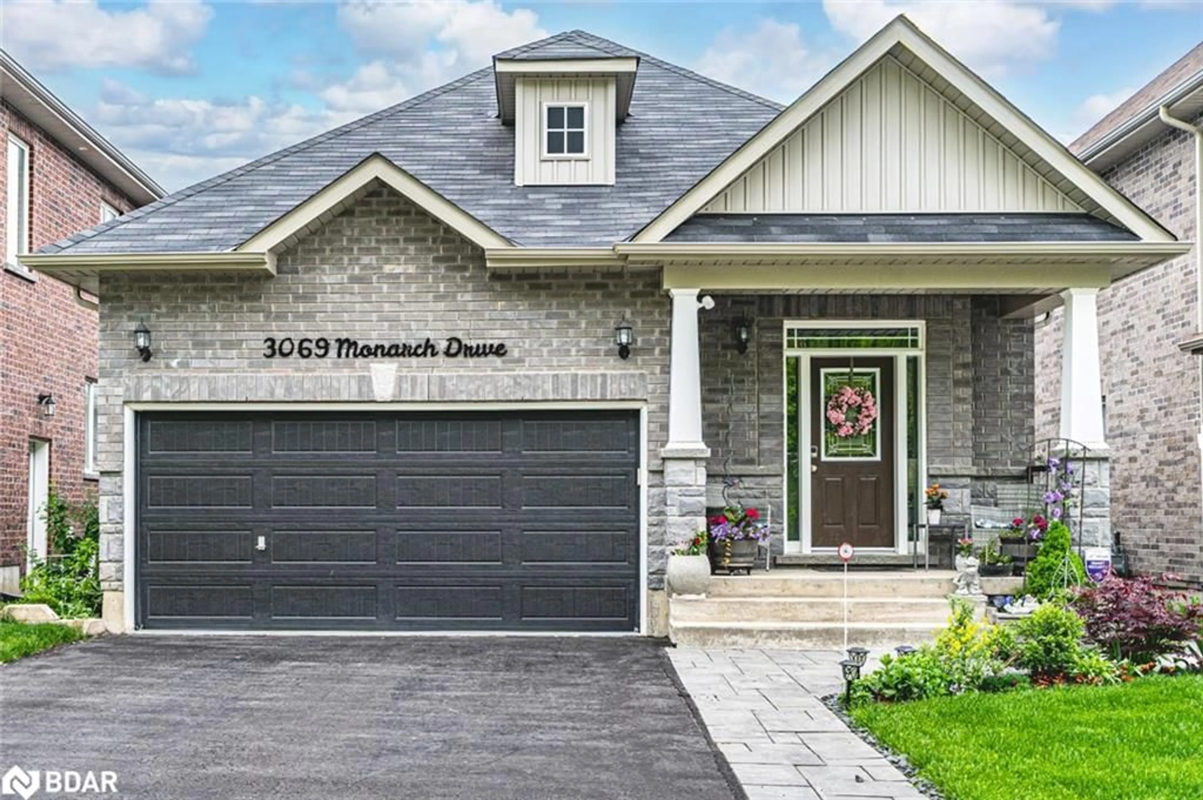 Home with brick exterior material, street for 3069 Monarch Dr, Orillia Ontario L3V 8K3