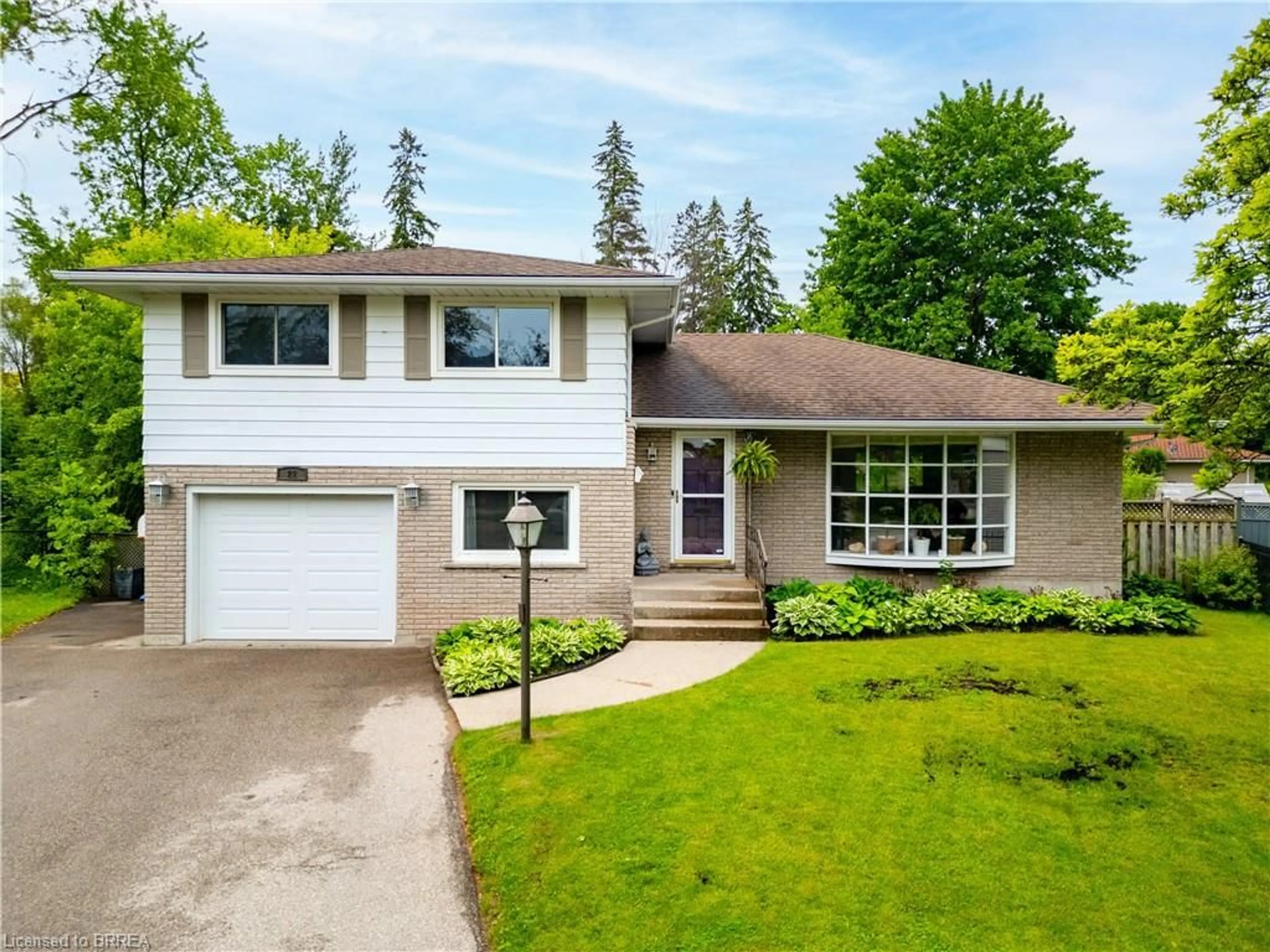 Home with vinyl exterior material, street for 22 Japonica Cres, Brantford Ontario N3R 1N6