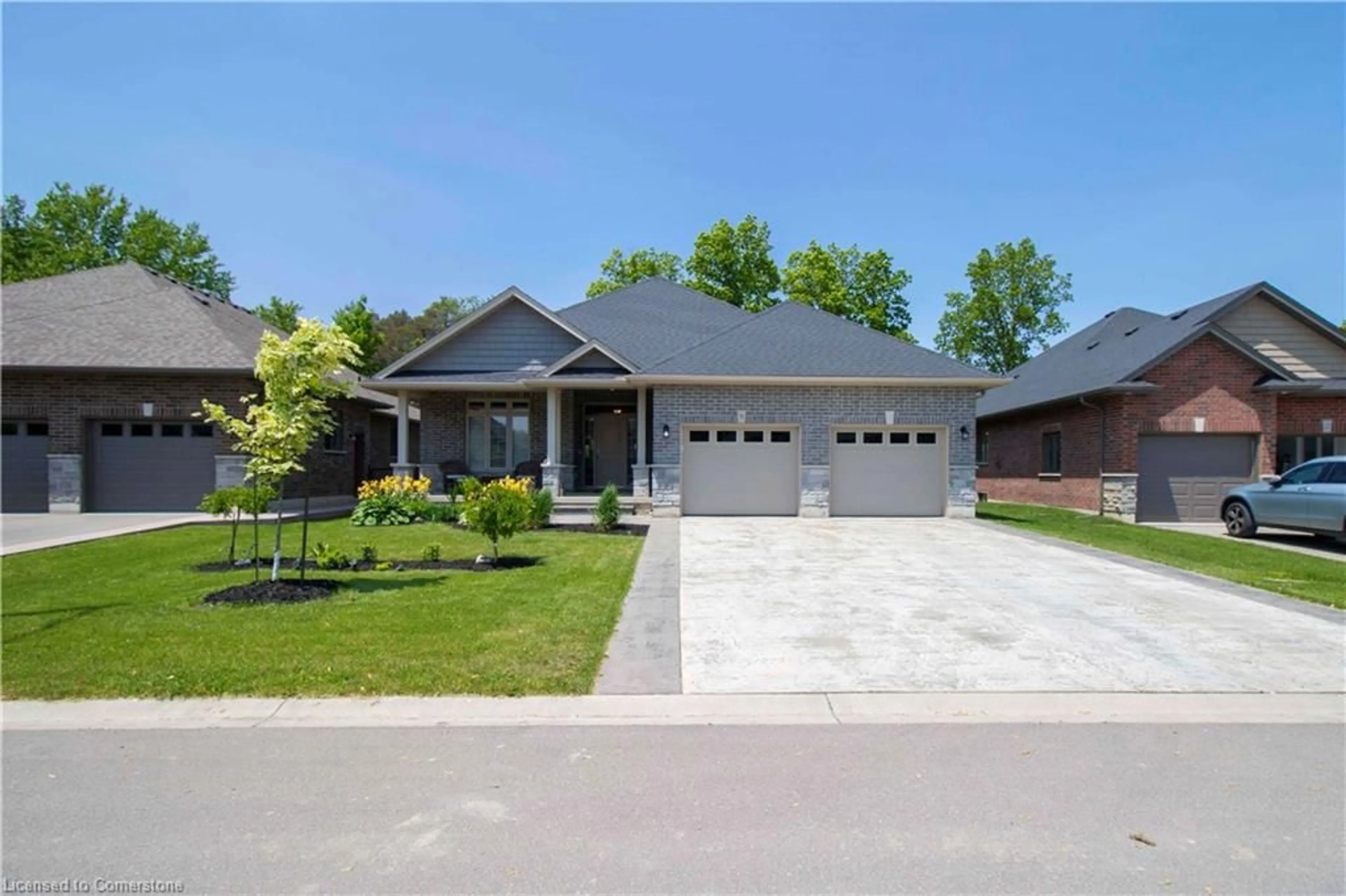 Home with brick exterior material, street for 31 Sycamore Dr, Port Dover Ontario N0A 1N6