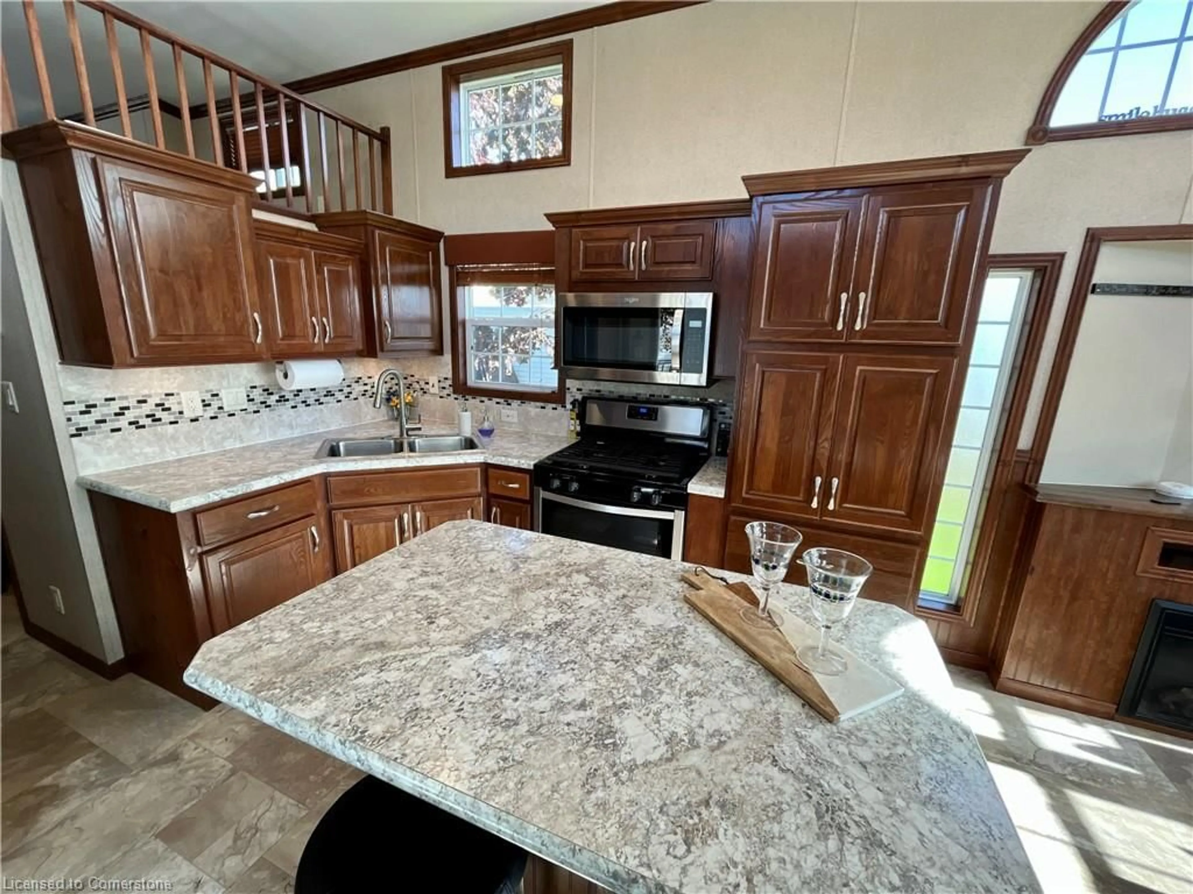 Open concept kitchen, ceramic/tile floor for 274 Front Rd #88, St. Williams Ontario N0E 1P0