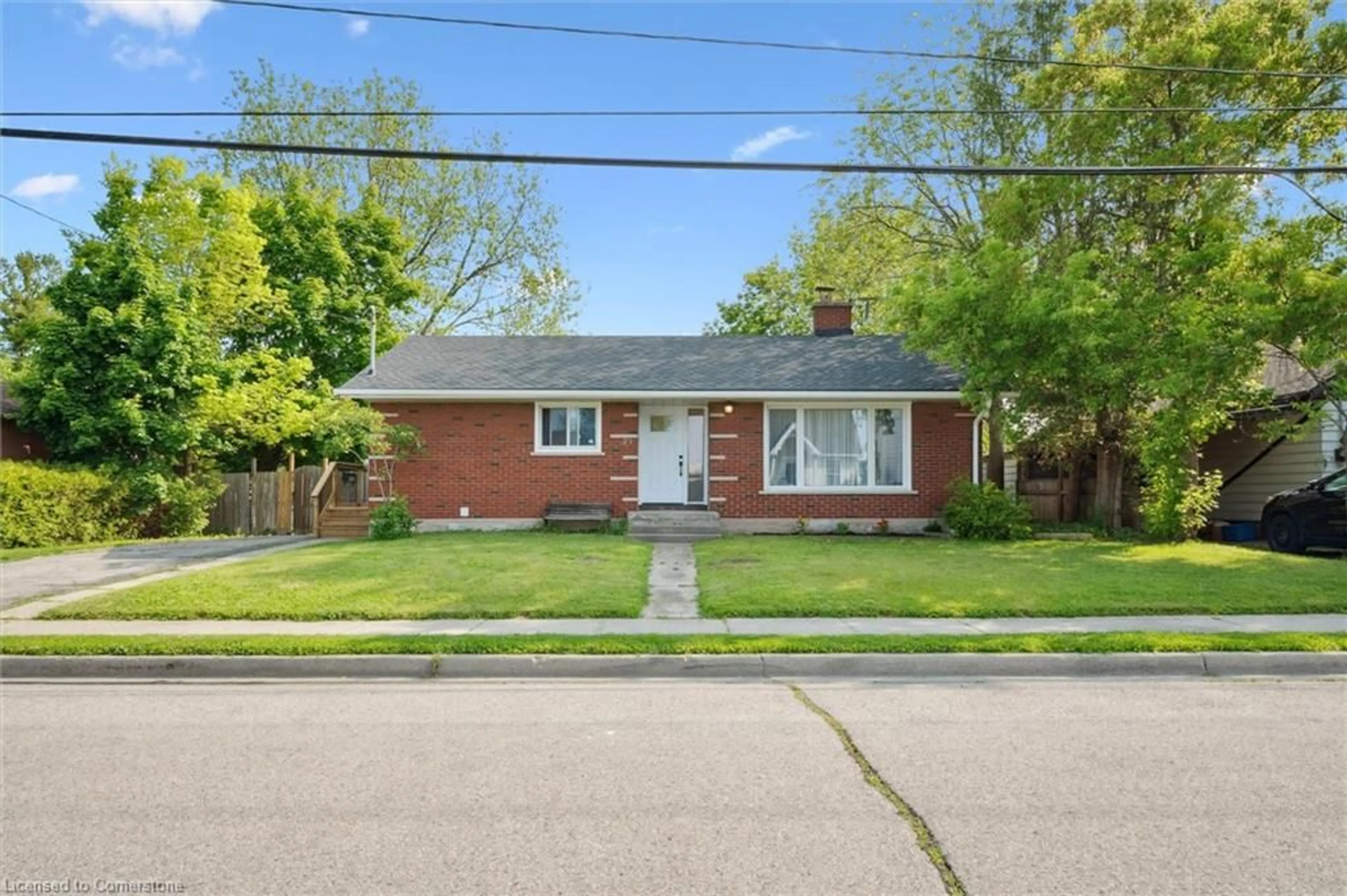 Home with brick exterior material, street for 27 Norfolk Ave, Cambridge Ontario N1R 3T5