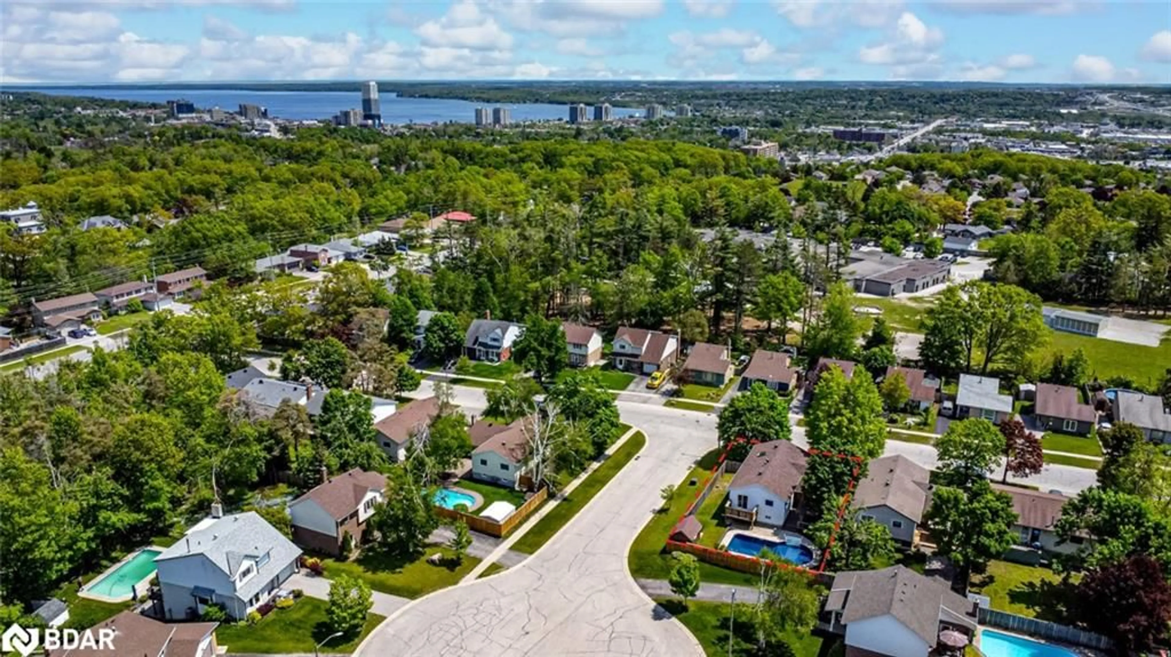 A pic from outside/outdoor area/front of a property/back of a property/a pic from drone, water/lake/river/ocean view for 20 Shelley Lane, Barrie Ontario L4N 4X8
