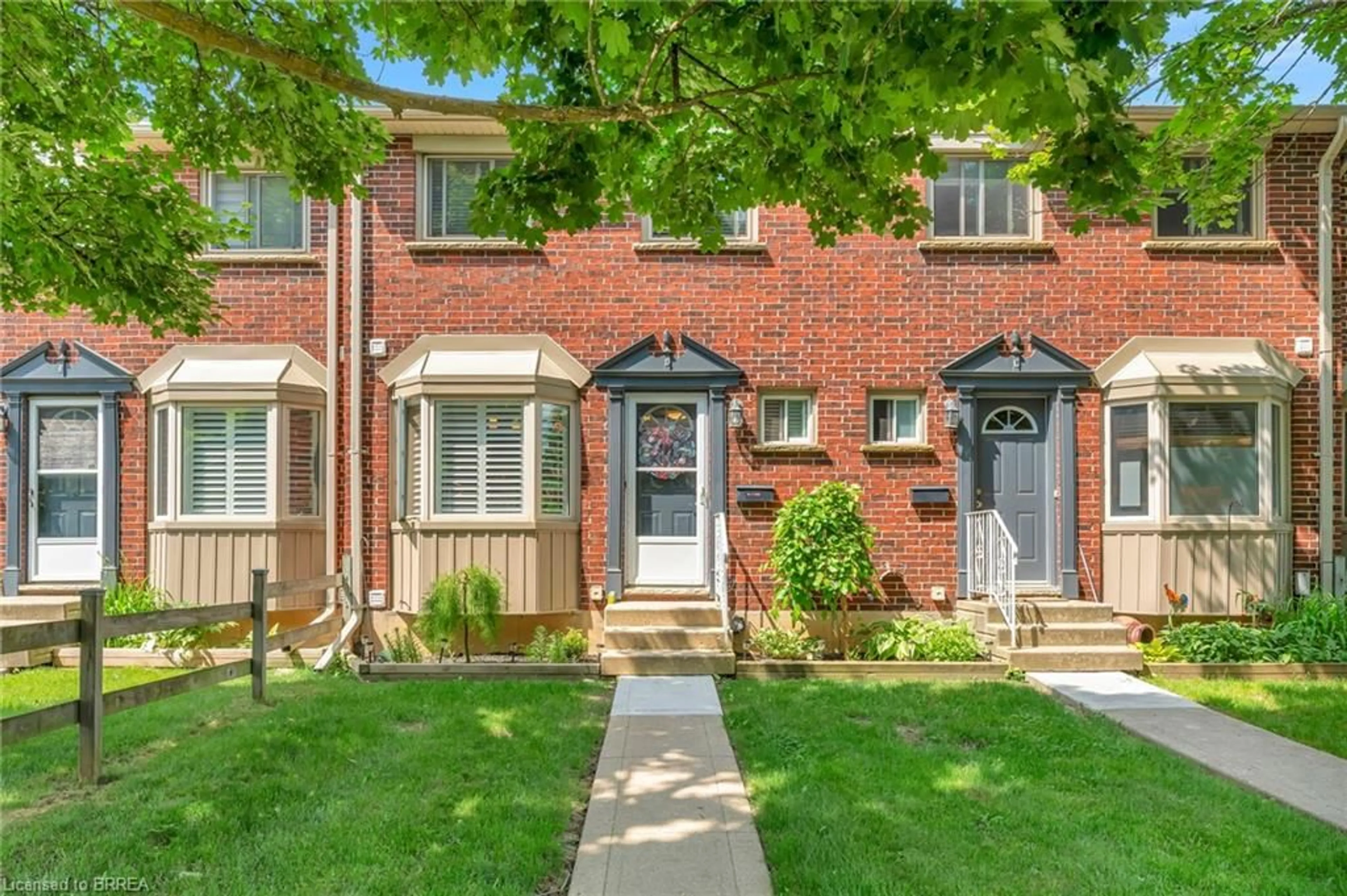 Home with brick exterior material, street for 153 Brantwood Park Rd #D, Brantford Ontario N3P 1X9