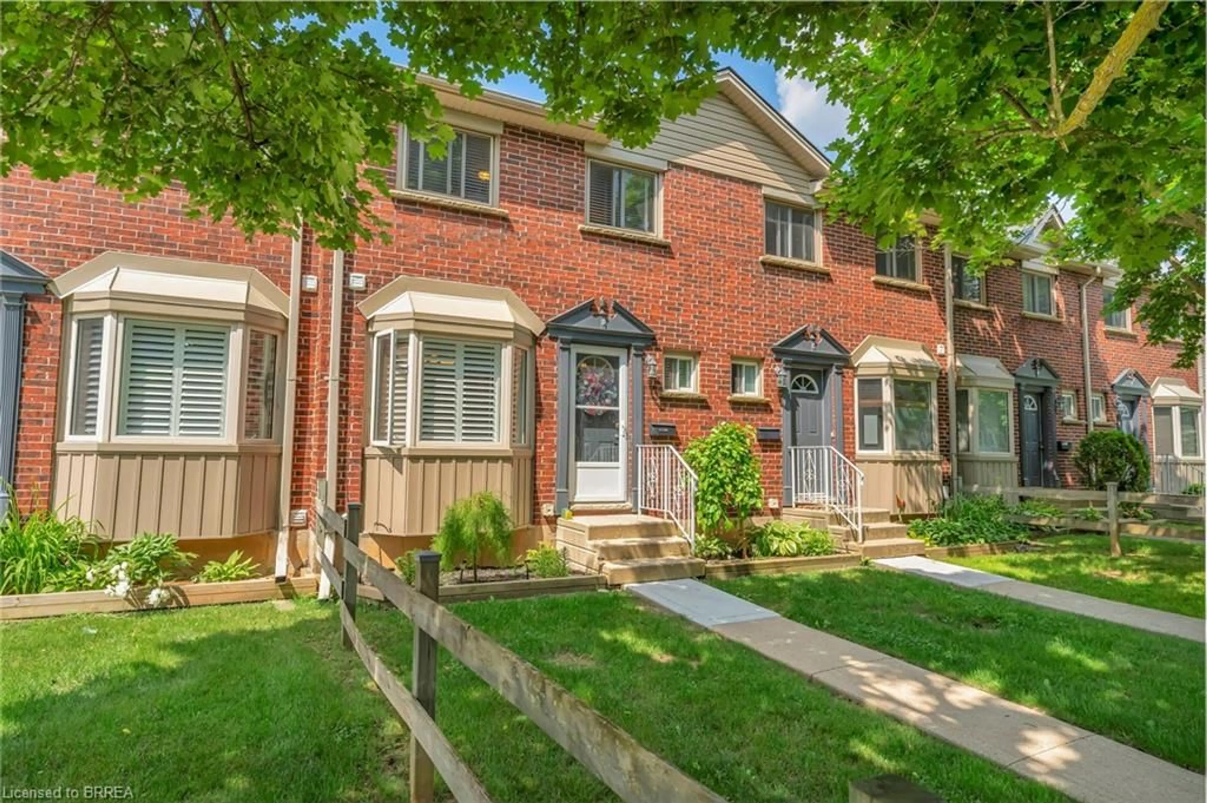 Home with brick exterior material, street for 153 Brantwood Park Rd #D, Brantford Ontario N3P 1X9