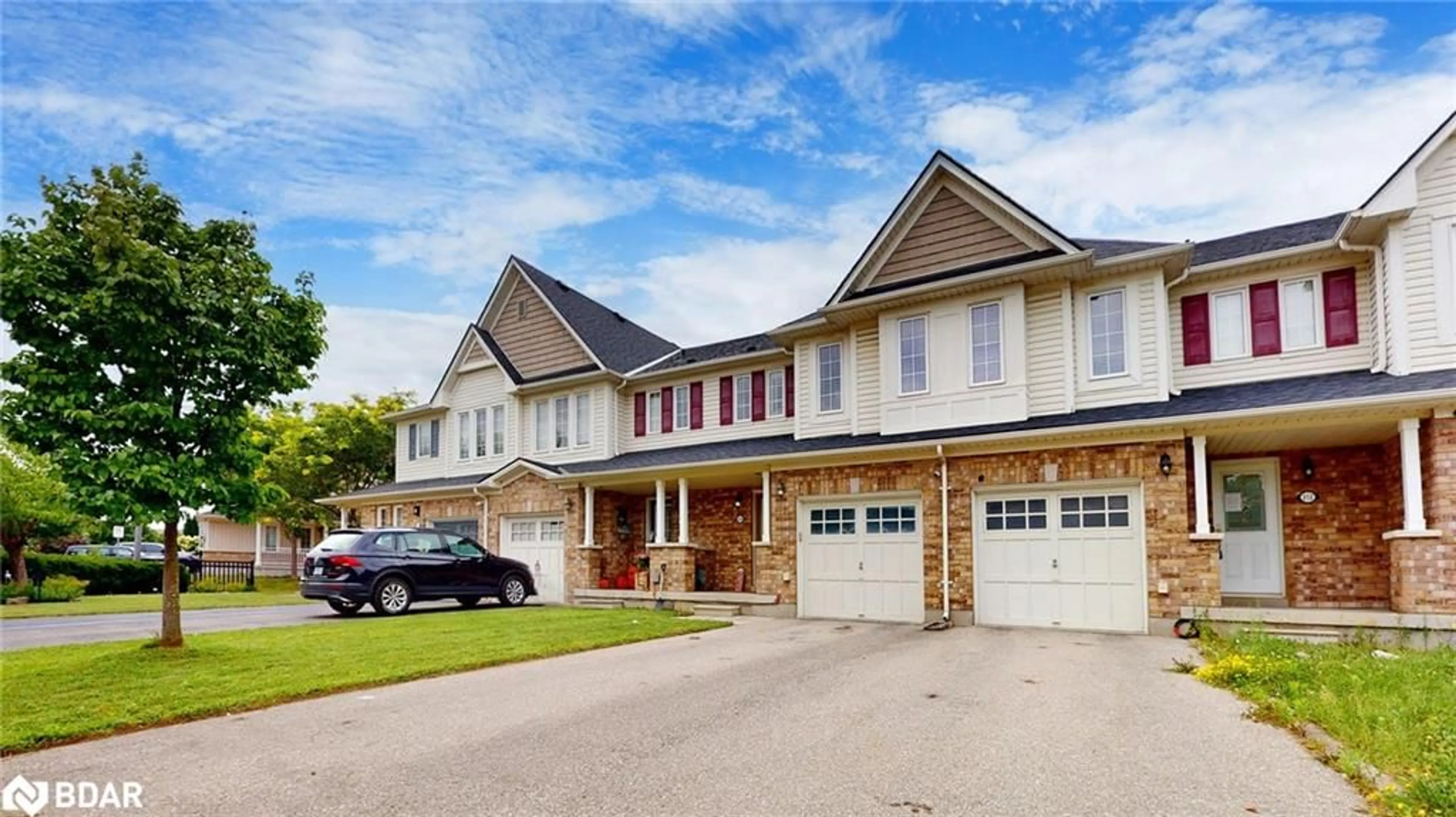 Home with brick exterior material, street for 214 Blackburn Drive Dr, Brantford Ontario N3T 0C4