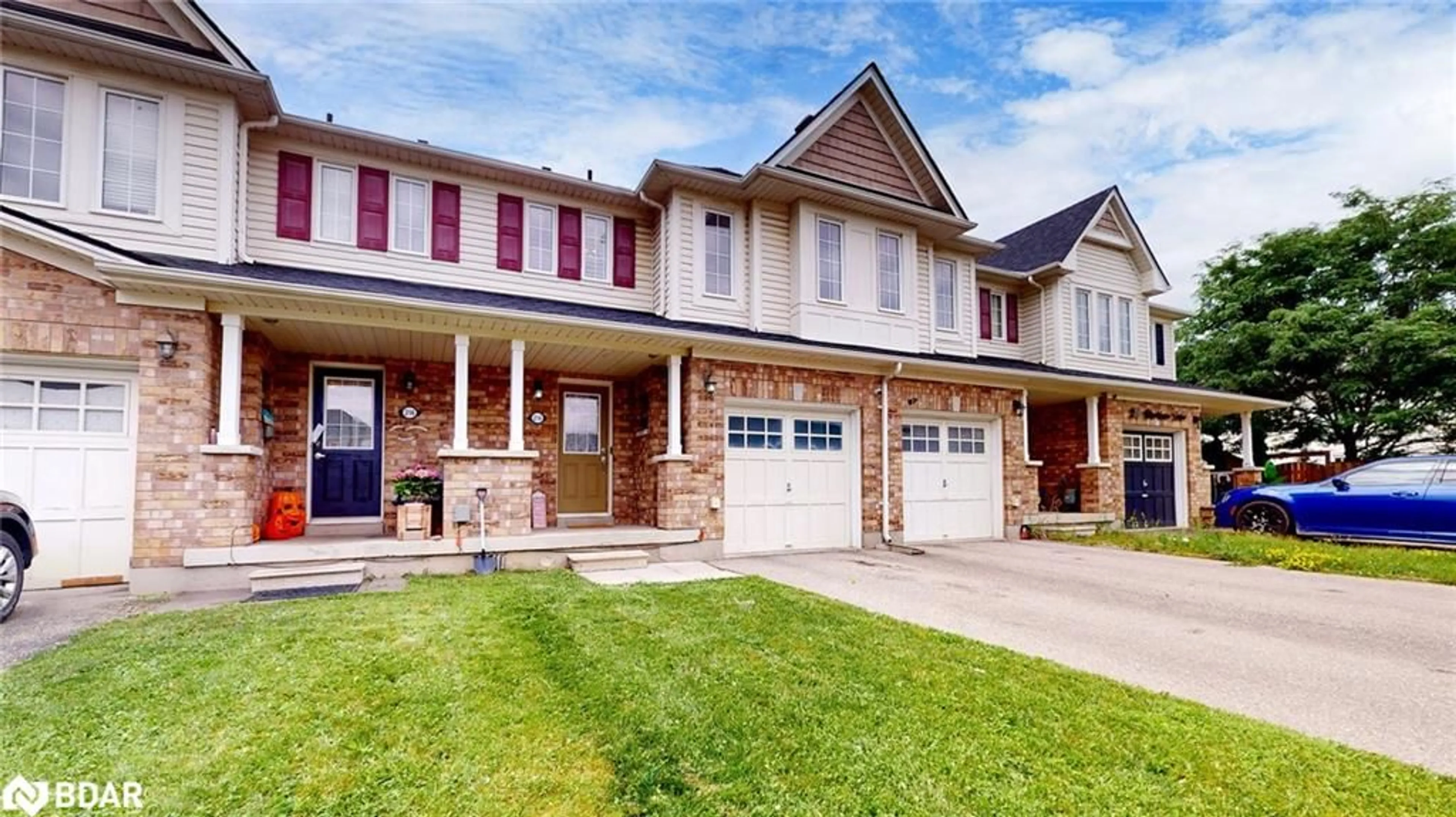 Home with brick exterior material, street for 214 Blackburn Drive Dr, Brantford Ontario N3T 0C4