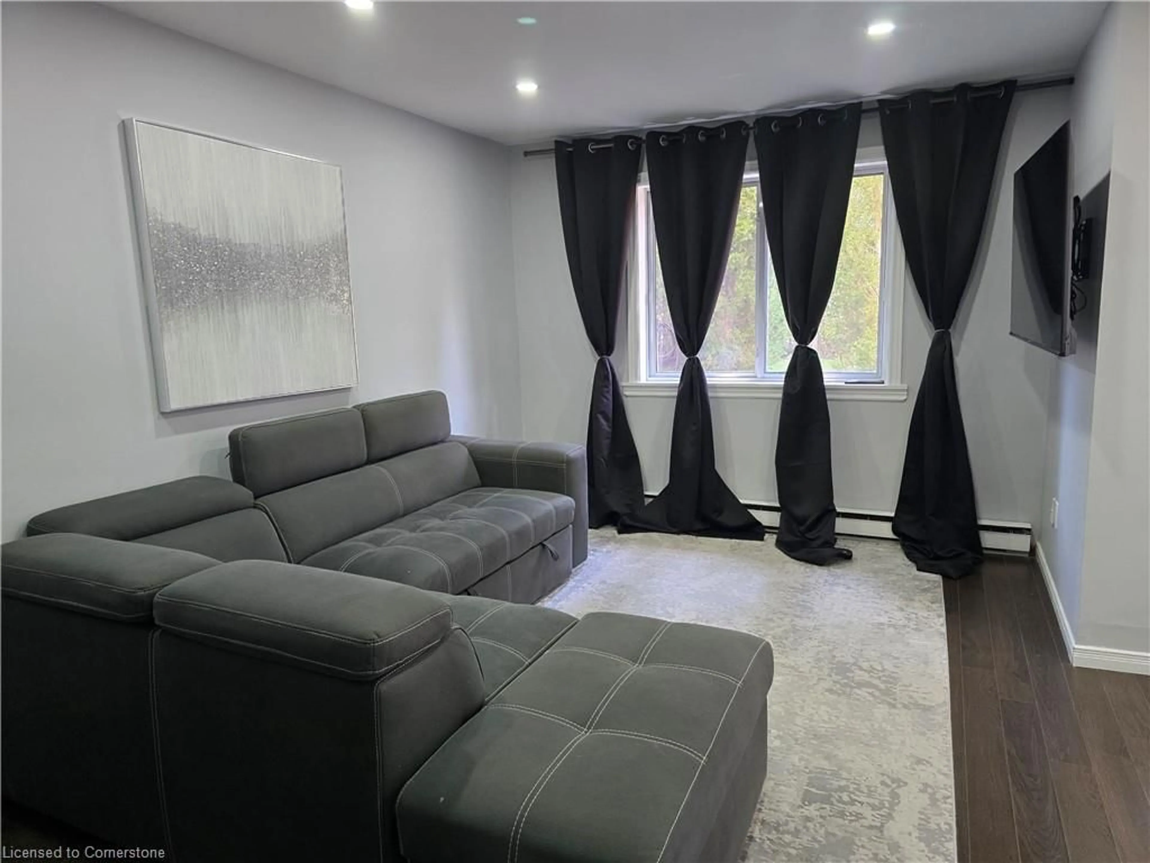 Living room with furniture, unknown for 1016 Falgarwood Dr #40, Oakville Ontario L6H 2P5