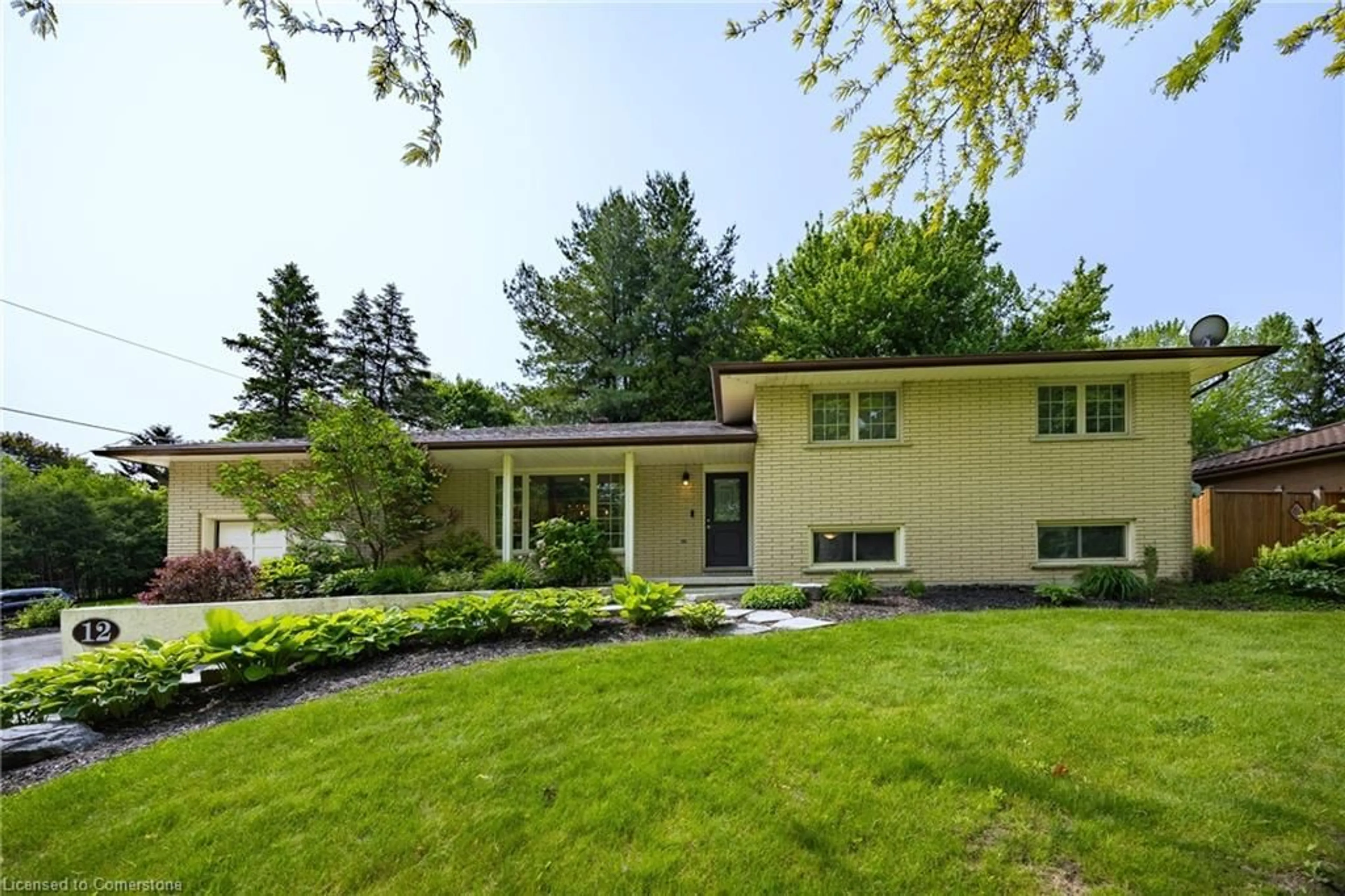 Home with brick exterior material, street for 12 Sunset Dr, Simcoe Ontario N3Y 3G3