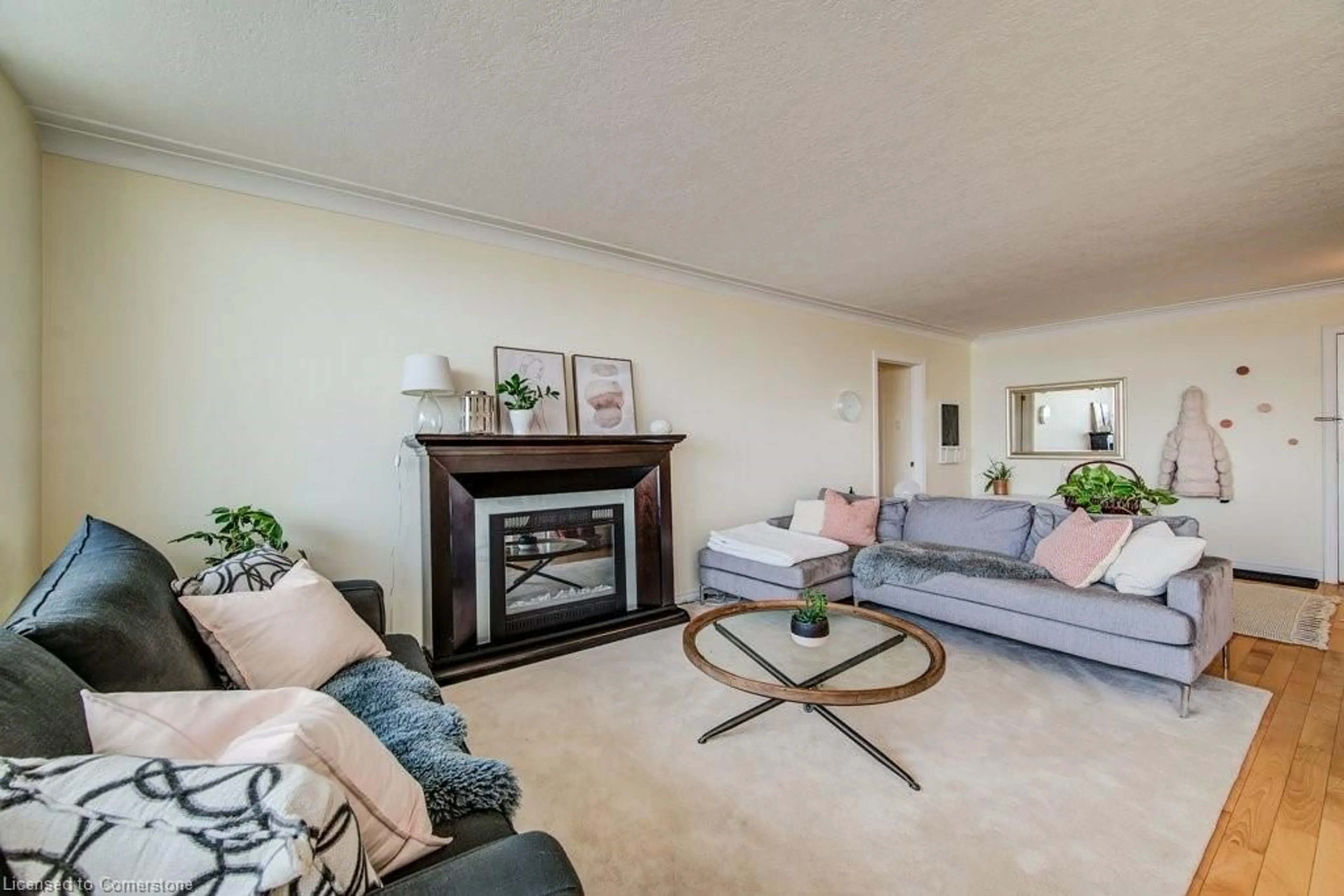 Living room with furniture, unknown for 65 Westmount Rd #910, Waterloo Ontario N2L 5G6