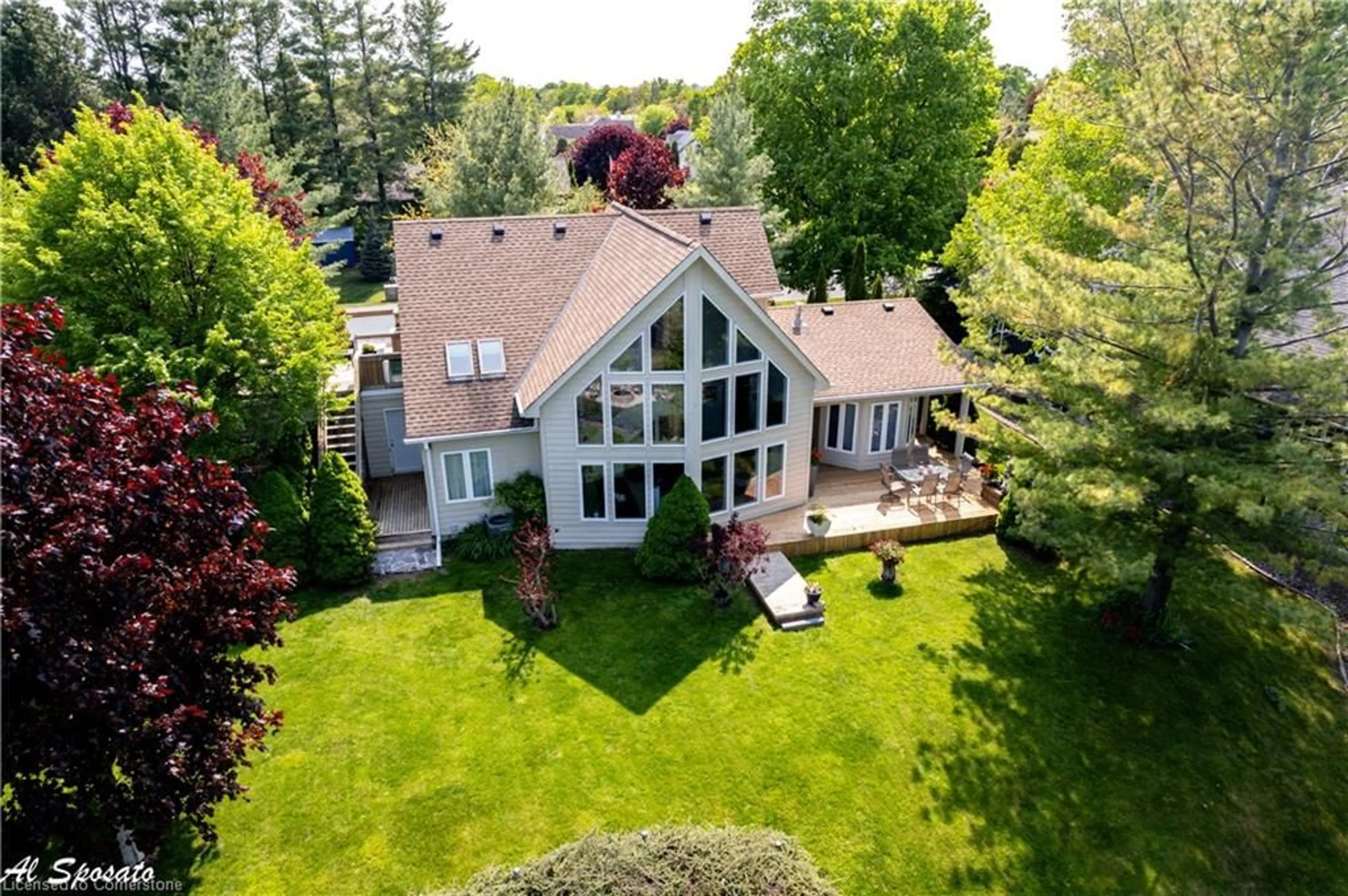 A pic from outside/outdoor area/front of a property/back of a property/a pic from drone, water/lake/river/ocean view for 130 Louisa St, Thornbury Ontario N0H 2P0