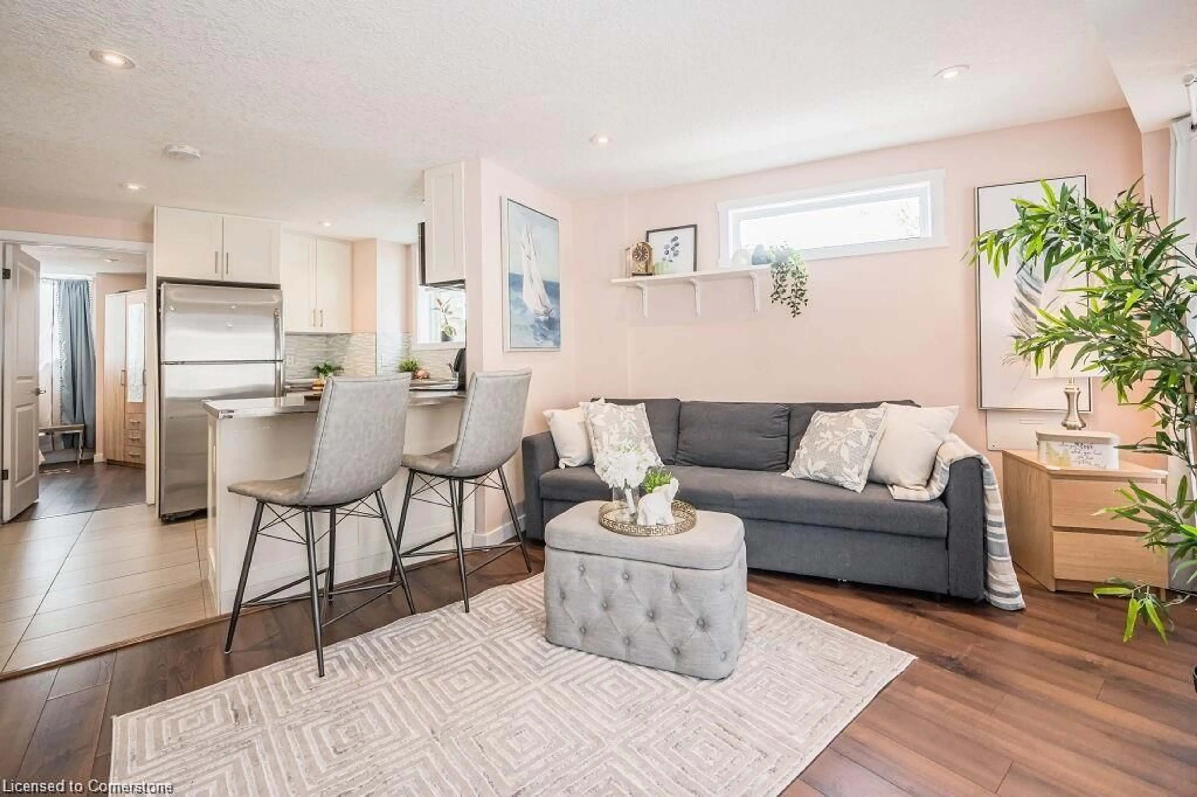 Living room with furniture, wood/laminate floor for 489 East Ave #A, Kitchener Ontario N2H 1Z7