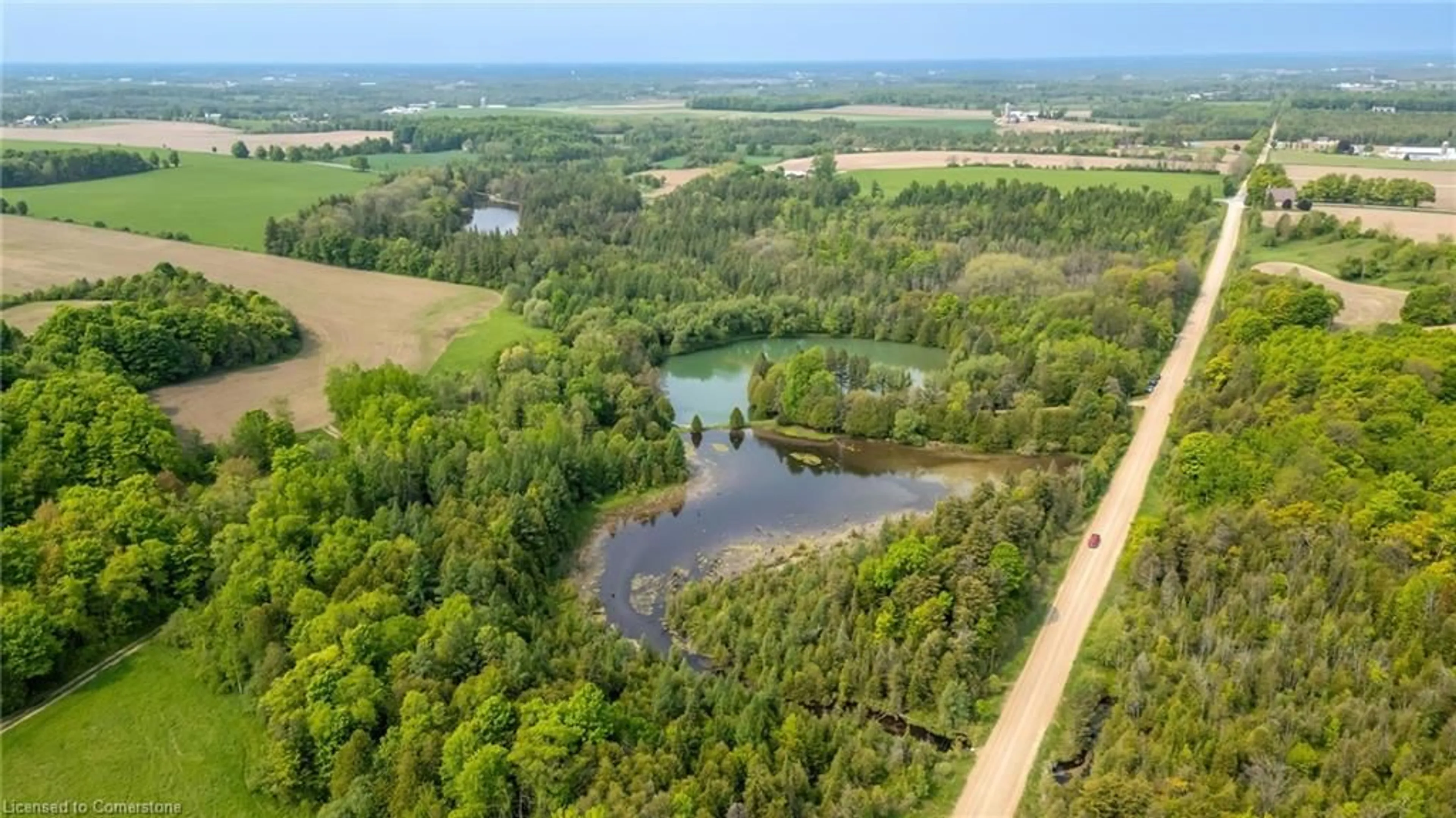 A pic from outside/outdoor area/front of a property/back of a property/a pic from drone, water/lake/river/ocean view for 84048 Southgate Rd 8 Rd, Southgate Ontario N0G 2L0