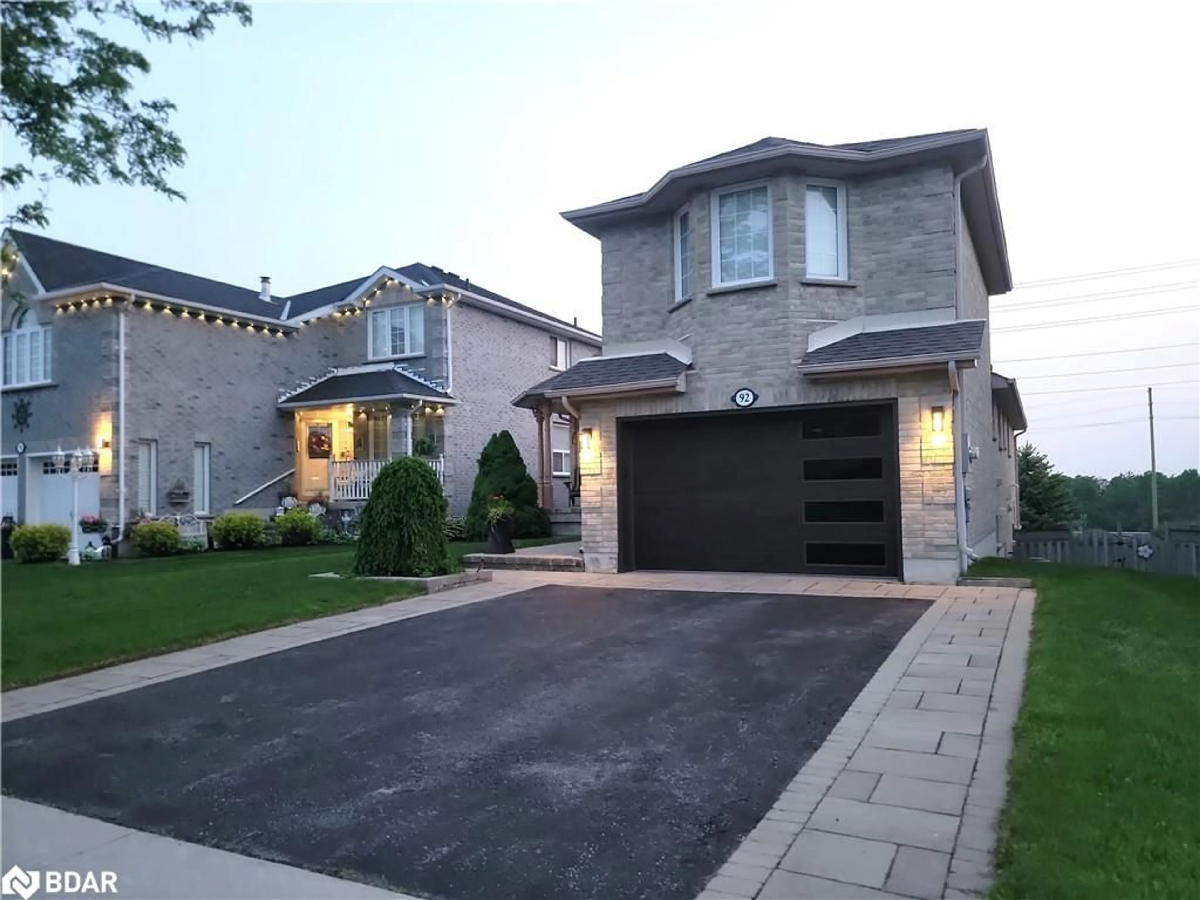 Home with brick exterior material, street for 92 Sundew Dr, Barrie Ontario L4N 9M1